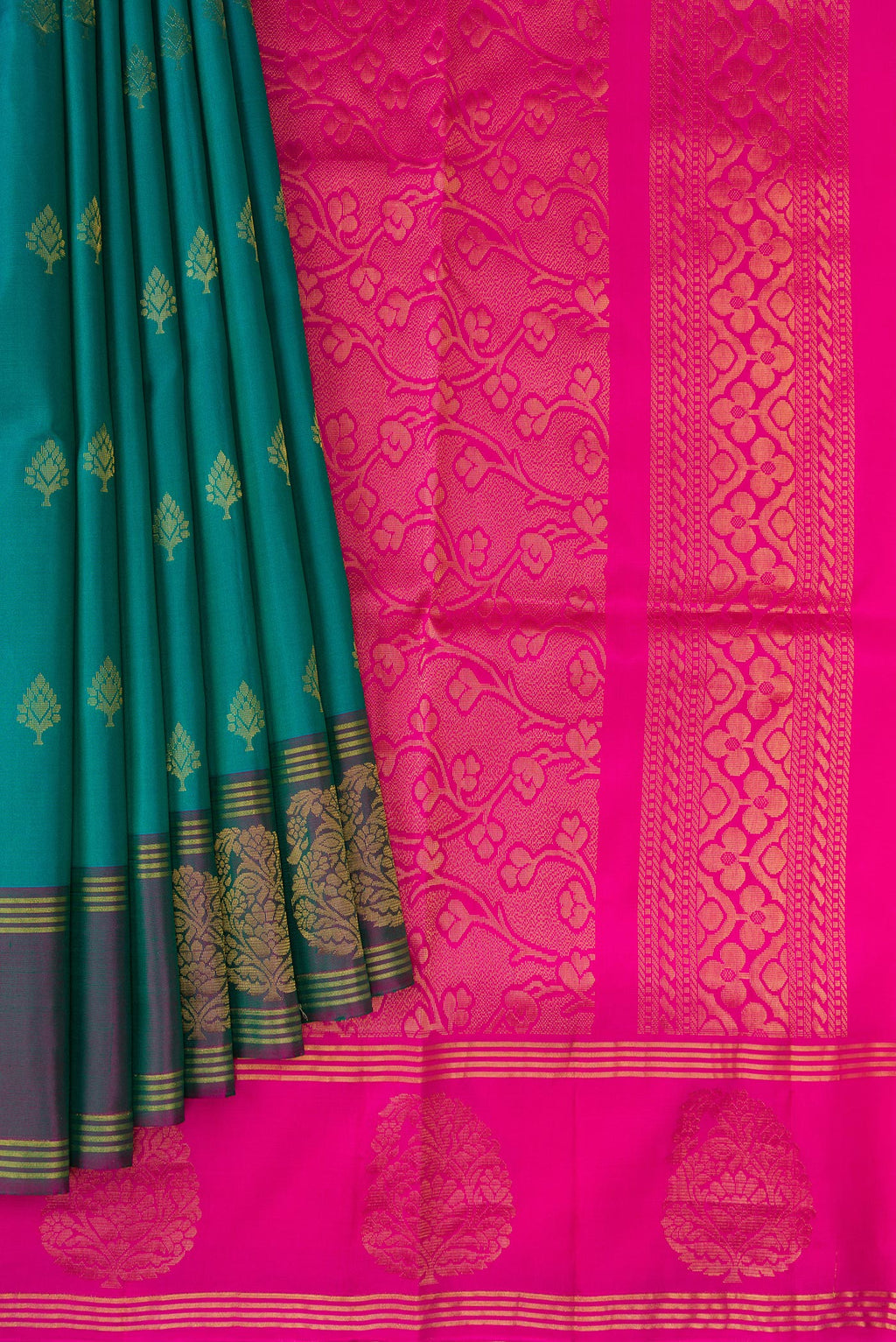 Pleats and pallu of Teal Soft Silk Saree with Zari Butta on the body and Fancy Border. 