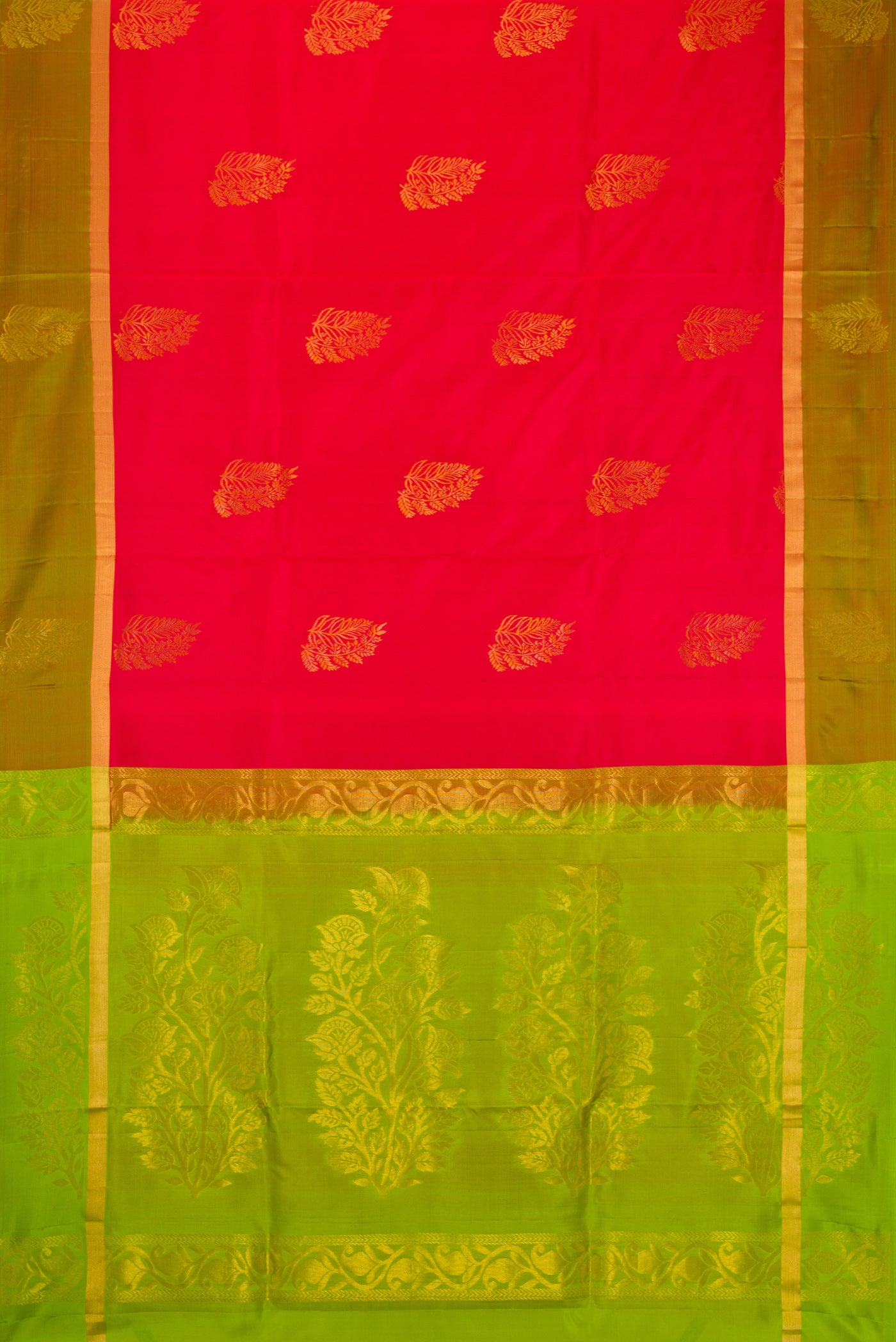 Pink Soft Silk Saree with Zari Butta on the body and Fancy Border.  displayed on a mannequin