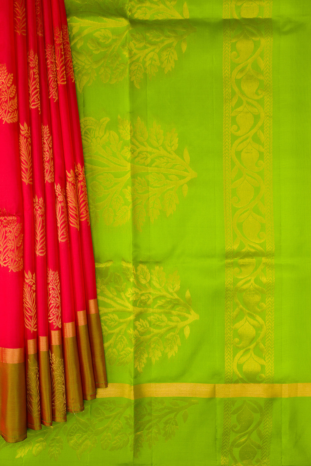 Pleats and pallu of Pink Soft Silk Saree with Zari Butta on the body and Fancy Border. 