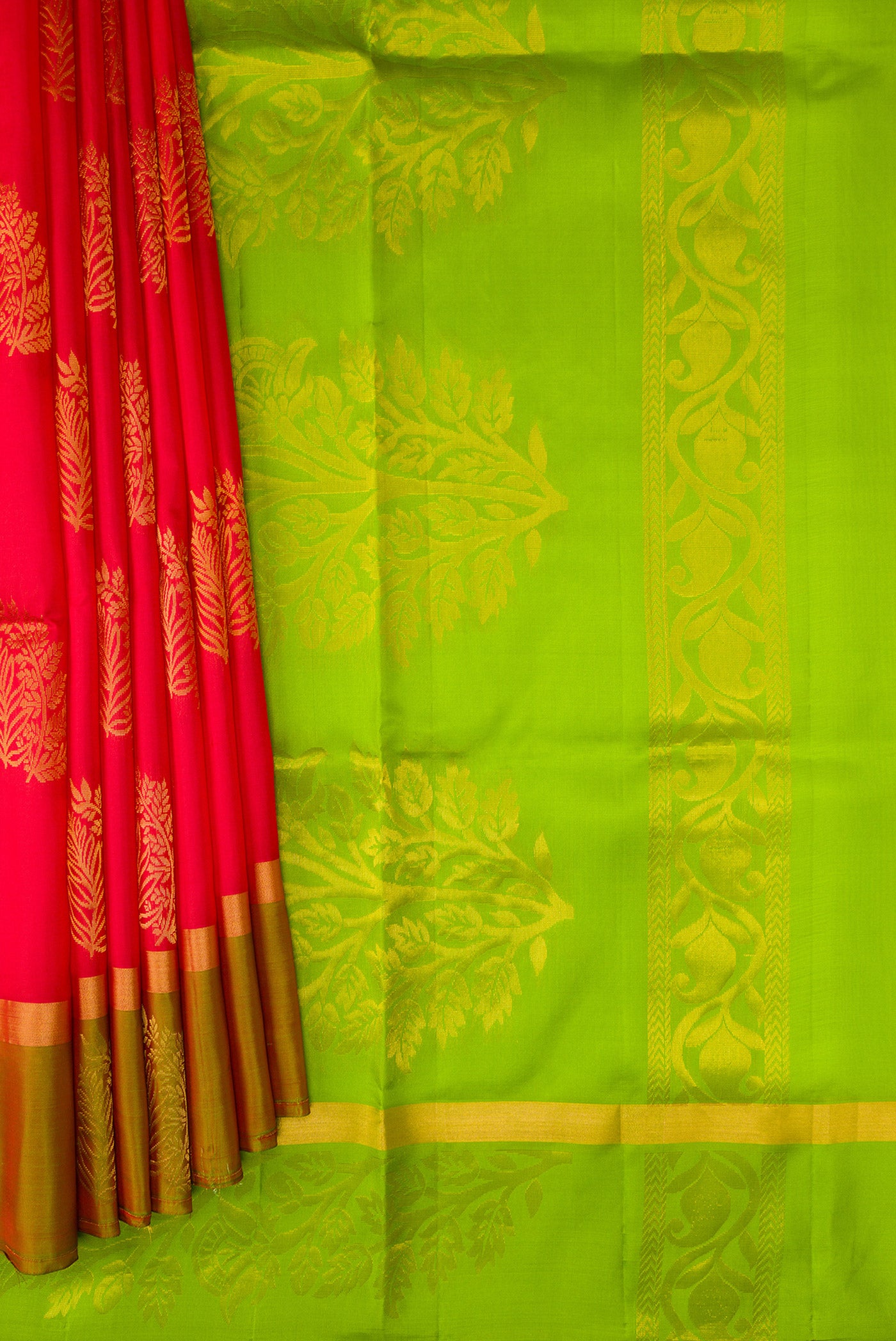 Pleats and pallu of Pink Soft Silk Saree with Zari Butta on the body and Fancy Border. 