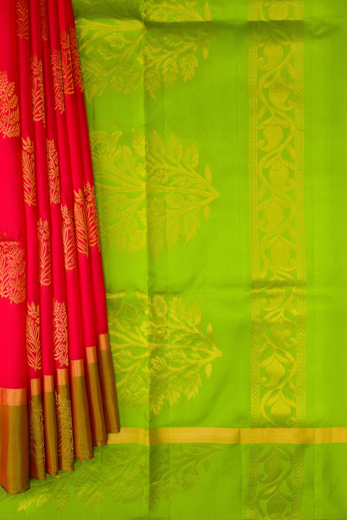 Pleats and pallu of Pink Soft Silk Saree with Zari Butta on the body and Fancy Border. 