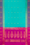 Sea Green Soft Silk Saree with Zari Butta on the body and Fancy Border.  displayed on a mannequin
