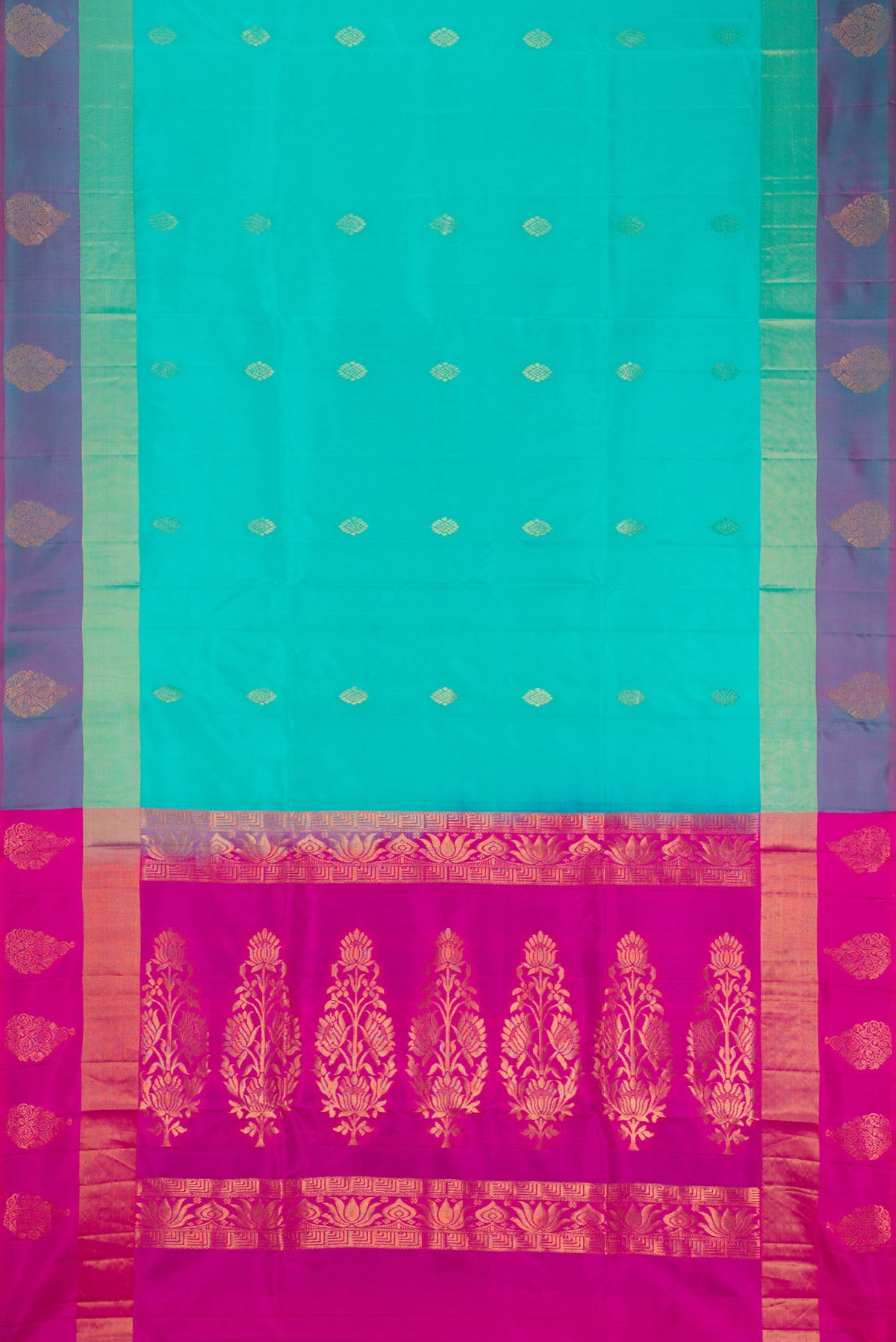 Flat view of Sea Green Soft Silk Saree with Zari Butta on the body and Fancy Border. 