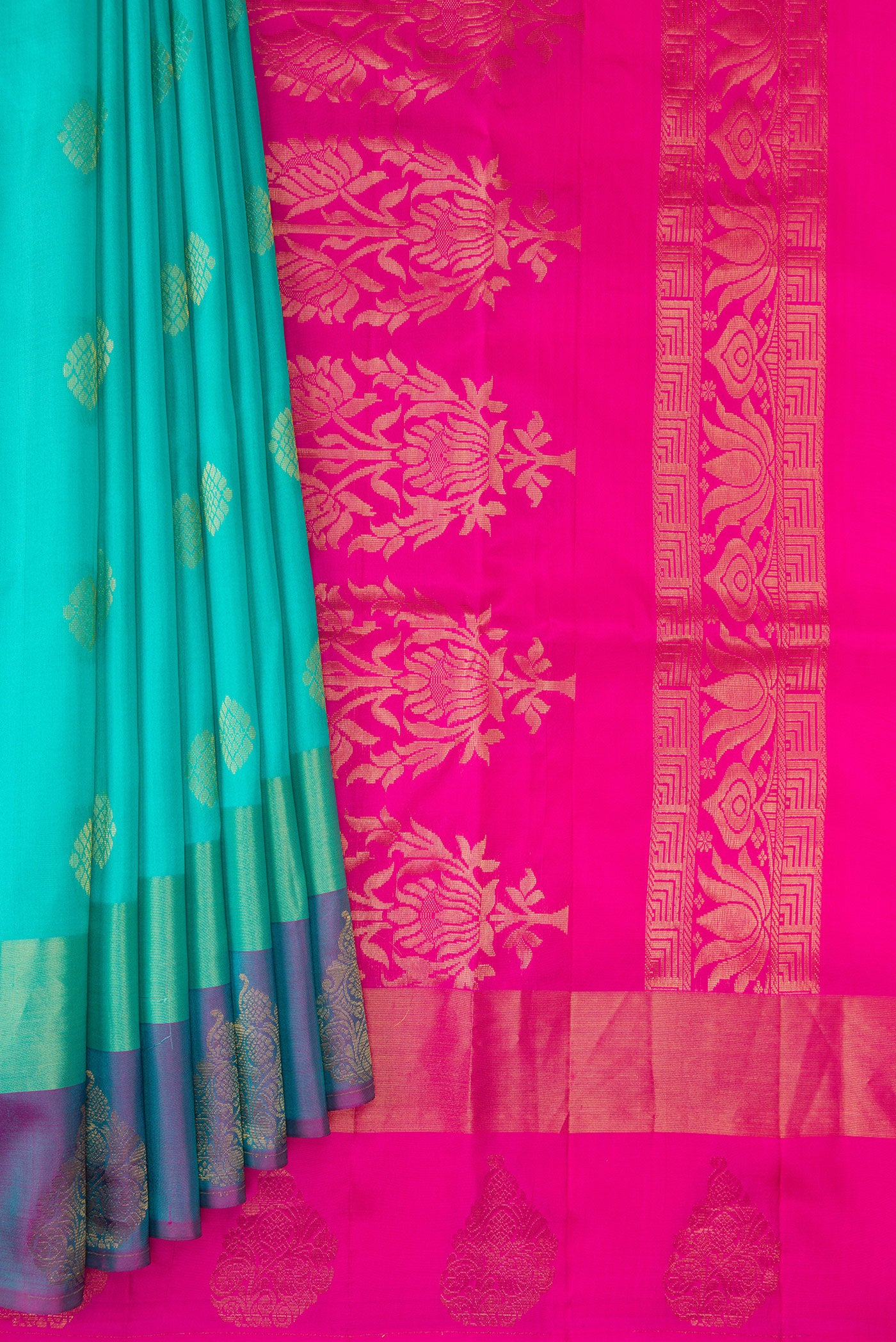 Pleats and pallu of Sea Green Soft Silk Saree with Zari Butta on the body and Fancy Border. 