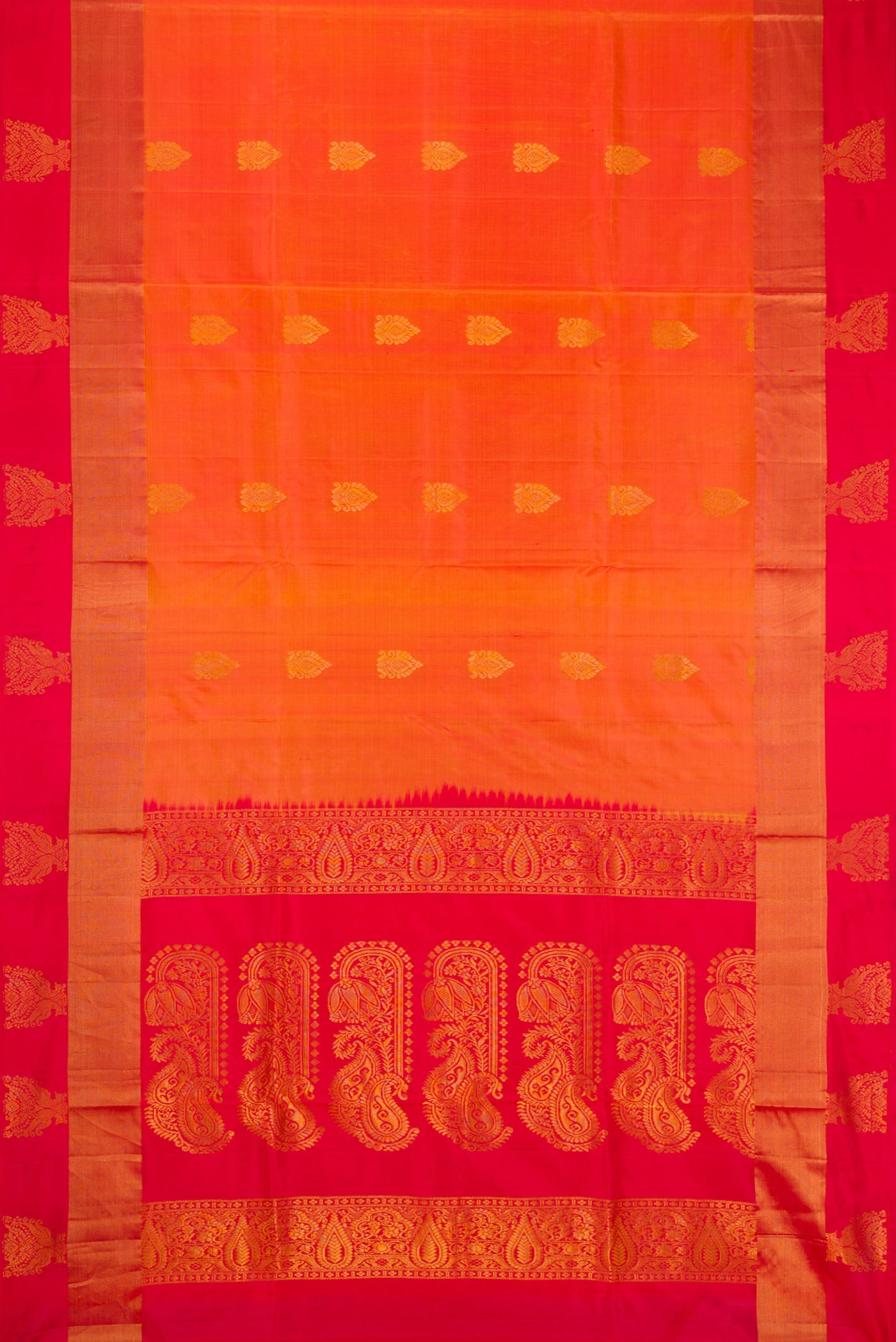Orange Dual Tone Soft Silk Saree with Zari Butta on the body and Fancy Border.  displayed on a mannequin