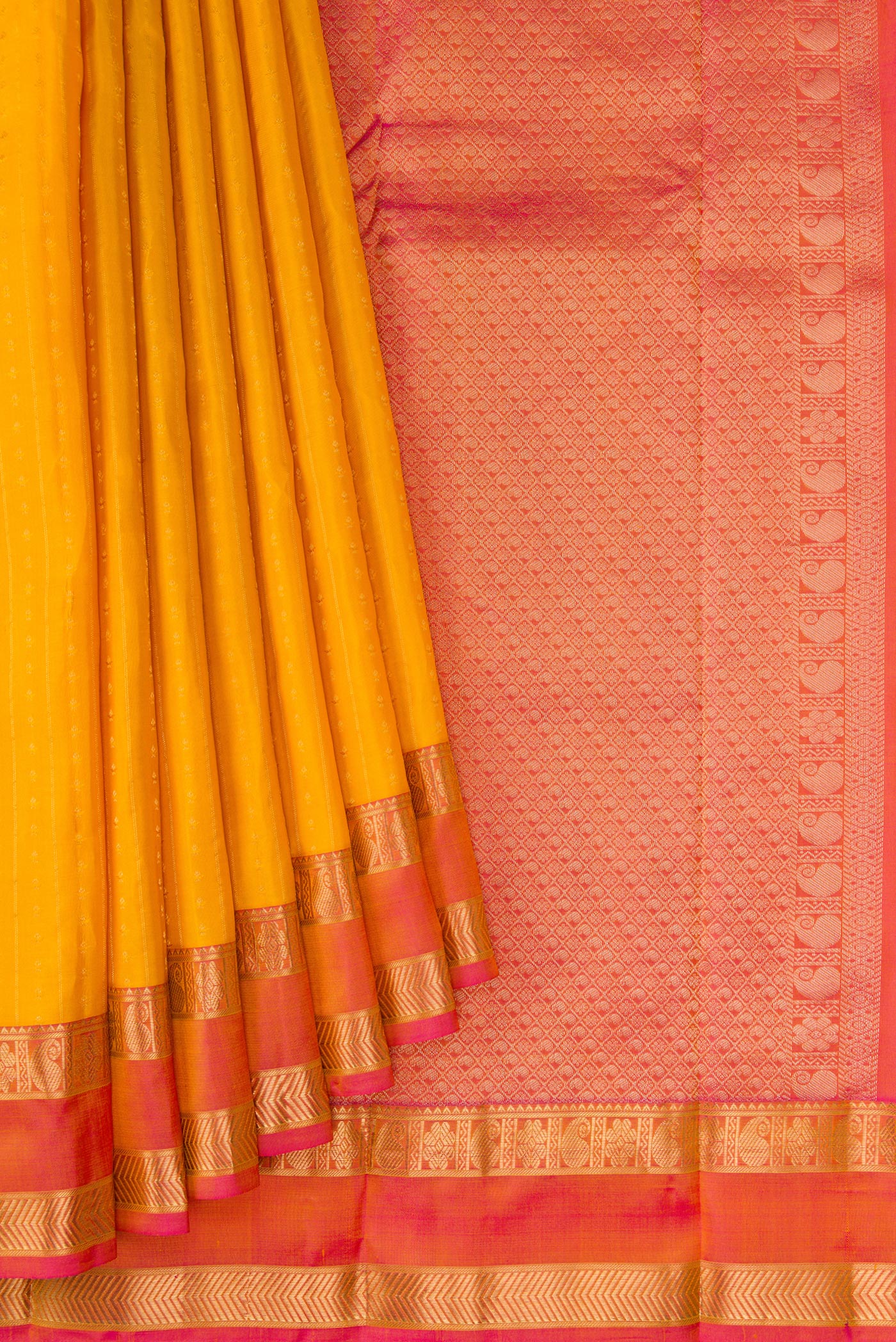 Pleats and pallu of Yellow Dual Tone Kanchipuram Silk Saree with Zari Butta on the body and Zari Border. 