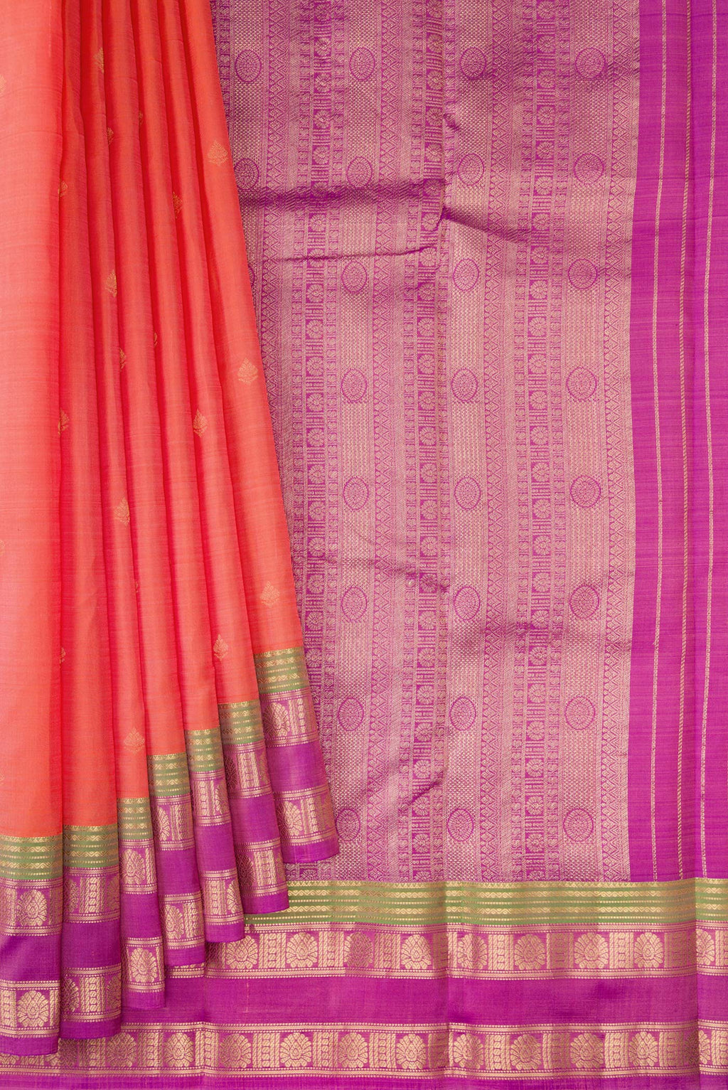 Pleats and pallu of Orange Dual Tone Kanchipuram Silk Saree with Zari Butta on the body and Zari Border. 