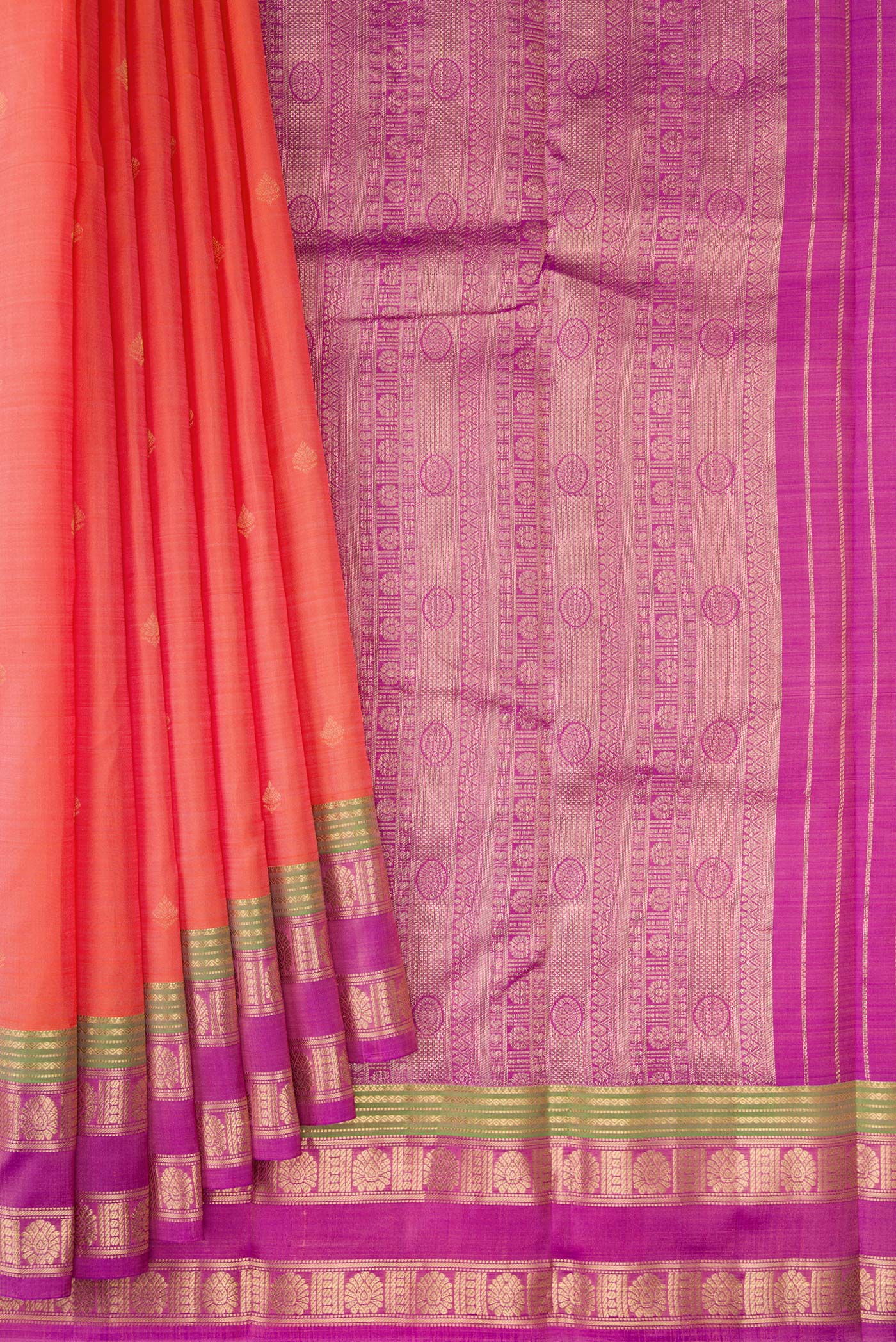 Pleats and pallu of Orange Dual Tone Kanchipuram Silk Saree with Zari Butta on the body and Zari Border. 