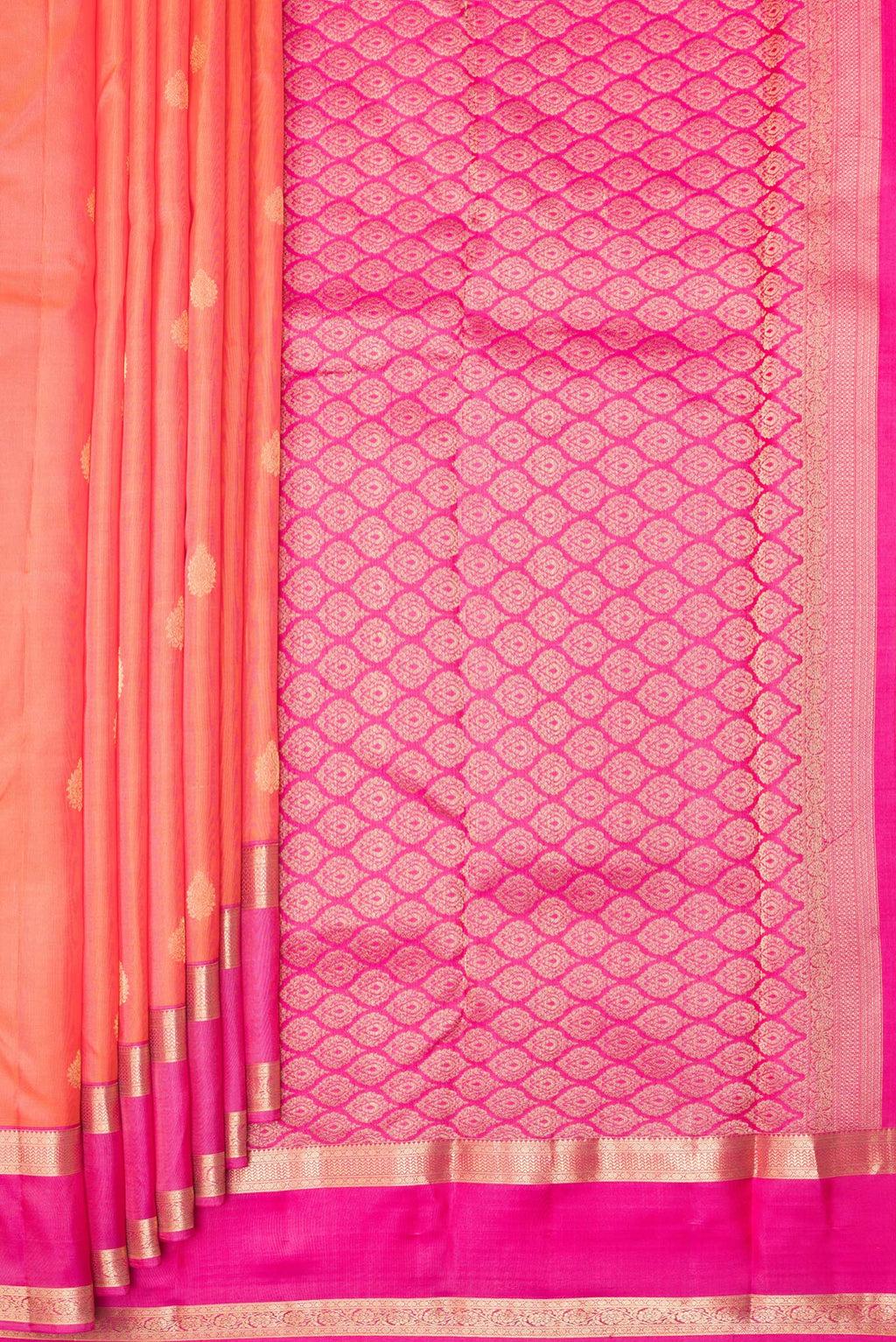 Pleats and pallu of Pure Silk Orange Kanchipuram Saree with Zari Butta on the body and Zari Border. 