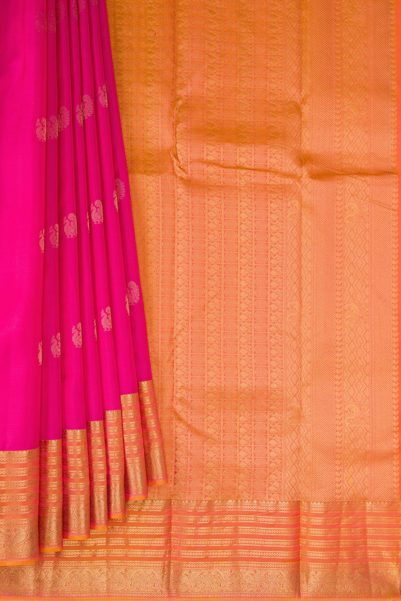 Pleats and pallu of Pink Kanchipuram Silk Saree with Zari Butta on the body and Zari Border. 