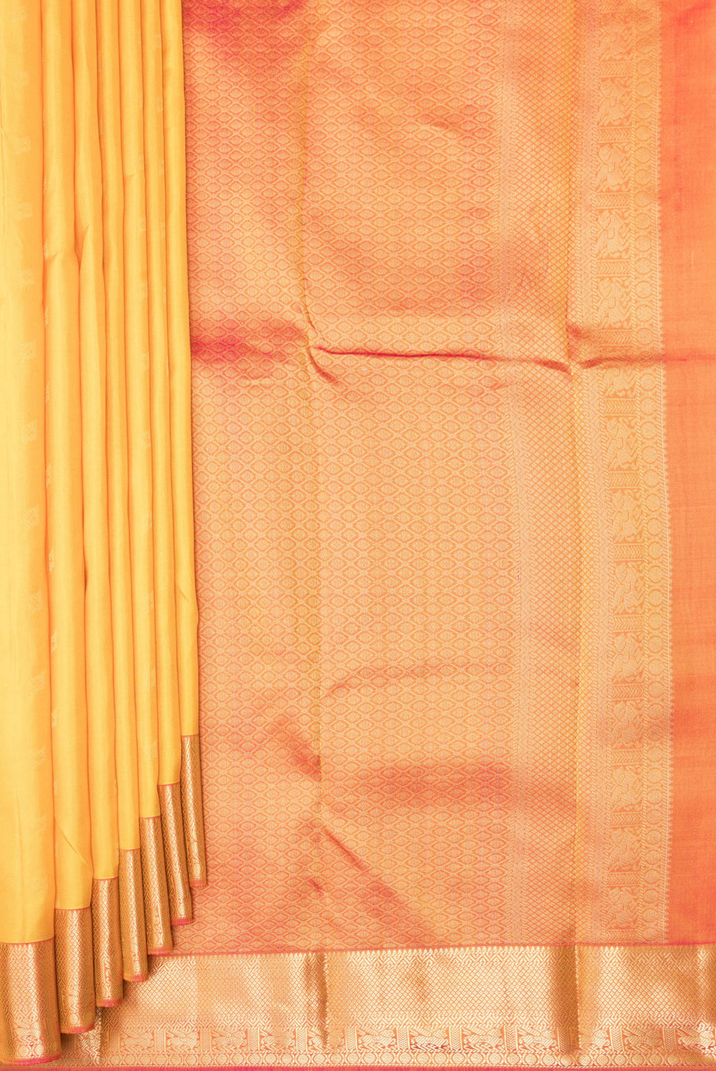 Pleats and pallu of Pure Silk Yellow Kanchipuram Saree with Zari Butta on the body and Zari Border. 