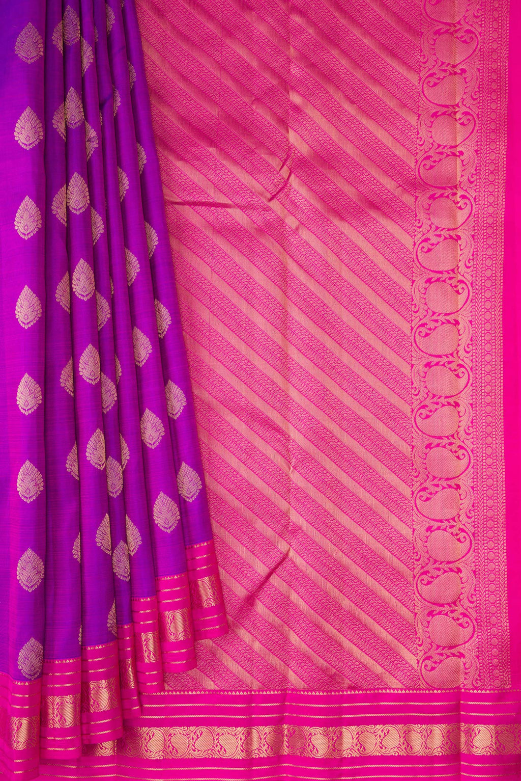 Pleats and pallu of Purple Kanchipuram Silk Saree with Zari Butta on the body and Zari Border. 