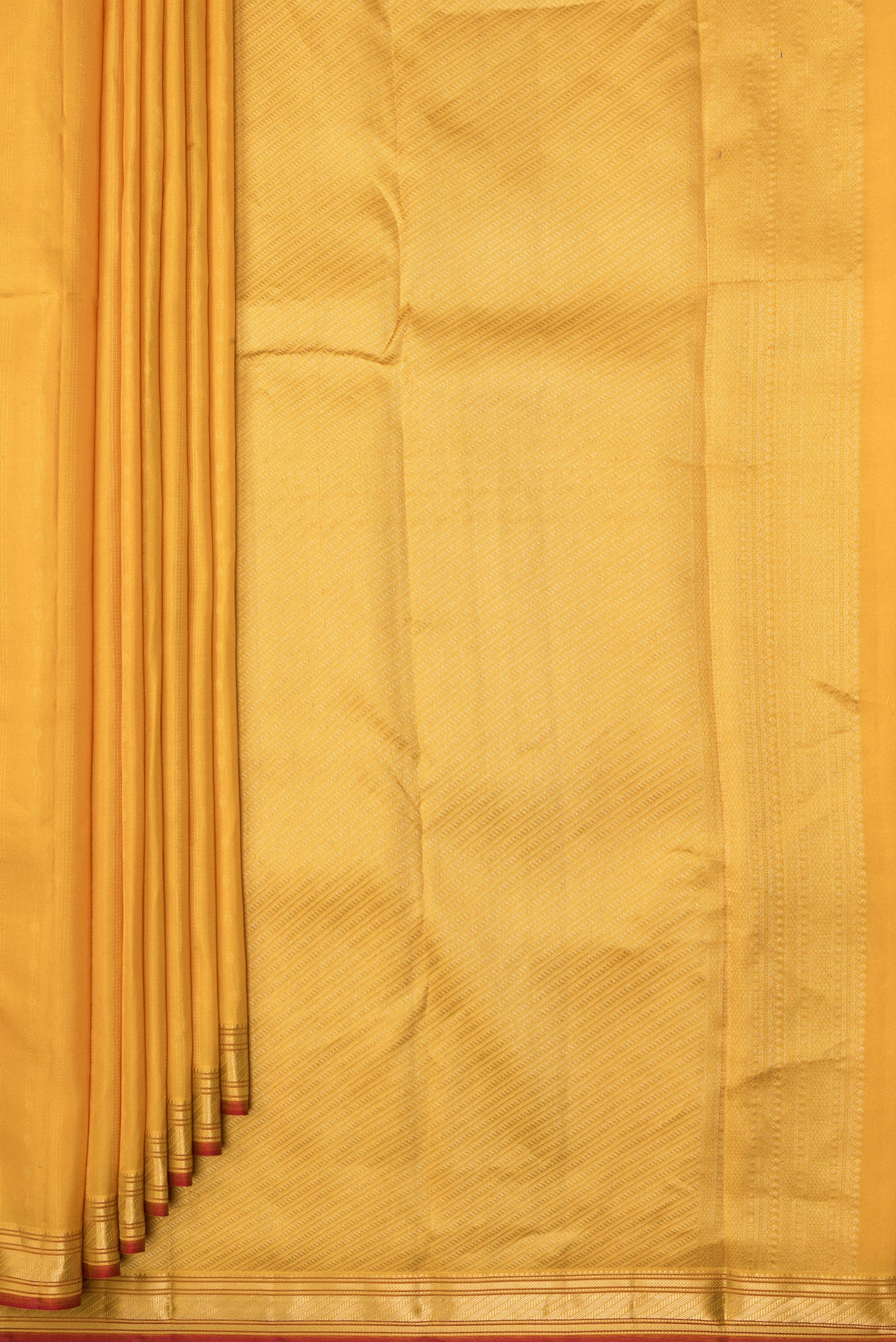 Pleats and pallu of Mustard Kanchipuram Silk Saree with Stripes on the body and Zari Border. 