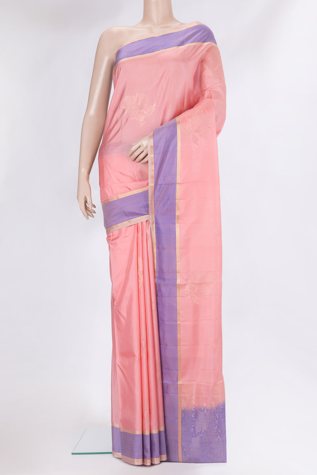Rose pink Soft Silk Saree with Zari Butta on the body and Fancy Border.  displayed on a mannequin