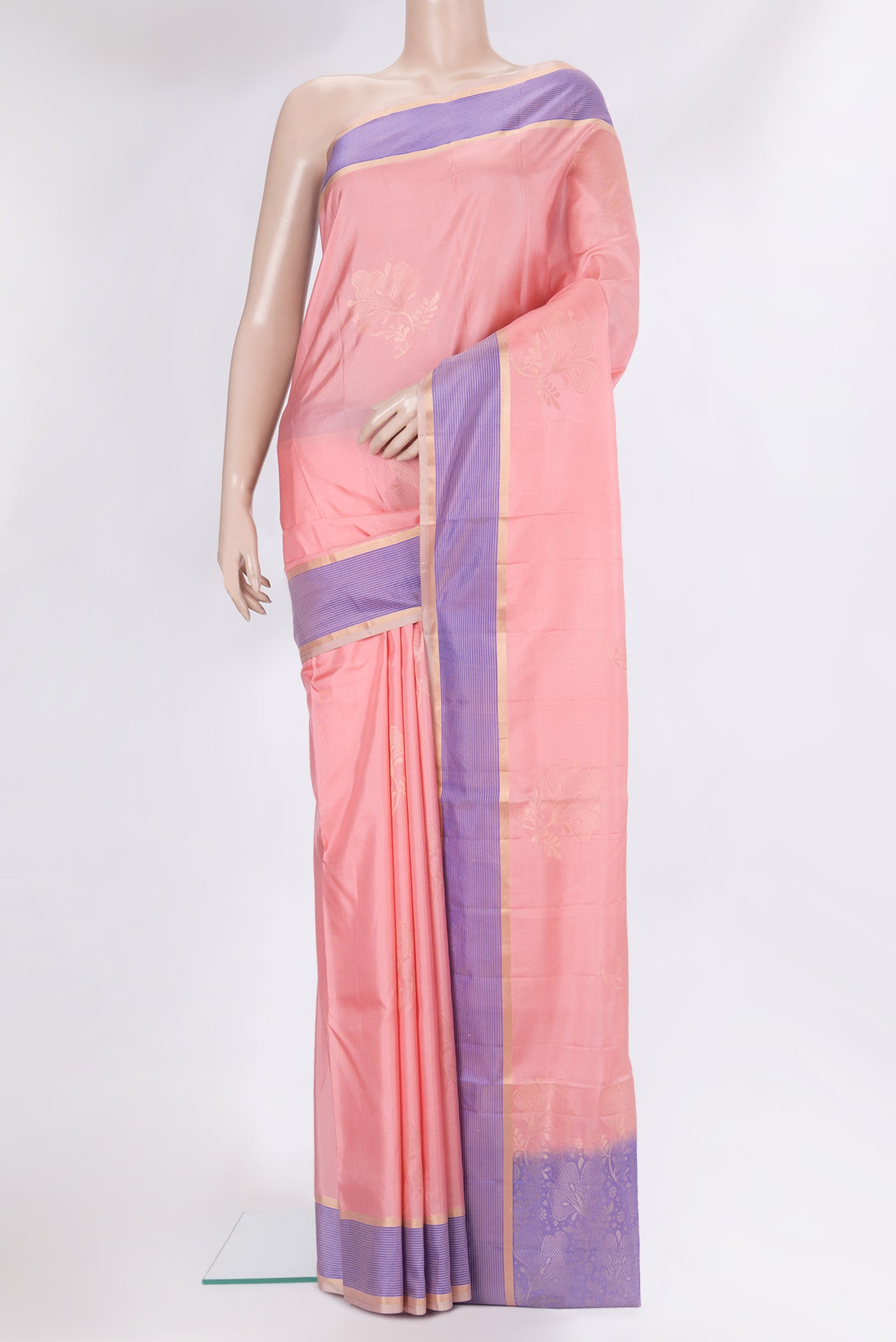 Rose pink Soft Silk Saree with Zari Butta on the body and Fancy Border.  displayed on a mannequin