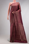Dark Mauve Dual Tone Kanjivaram Silk Saree with Jacquard design on the body and Zari Border.  displayed on a mannequin