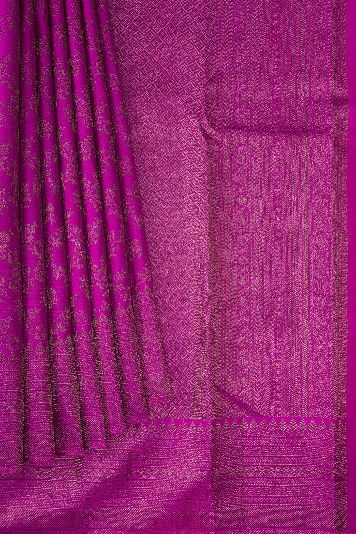 Pleats and pallu of Purple Kanjivaram Silk Saree with Zari Brocade on the body and Fancy Border. 