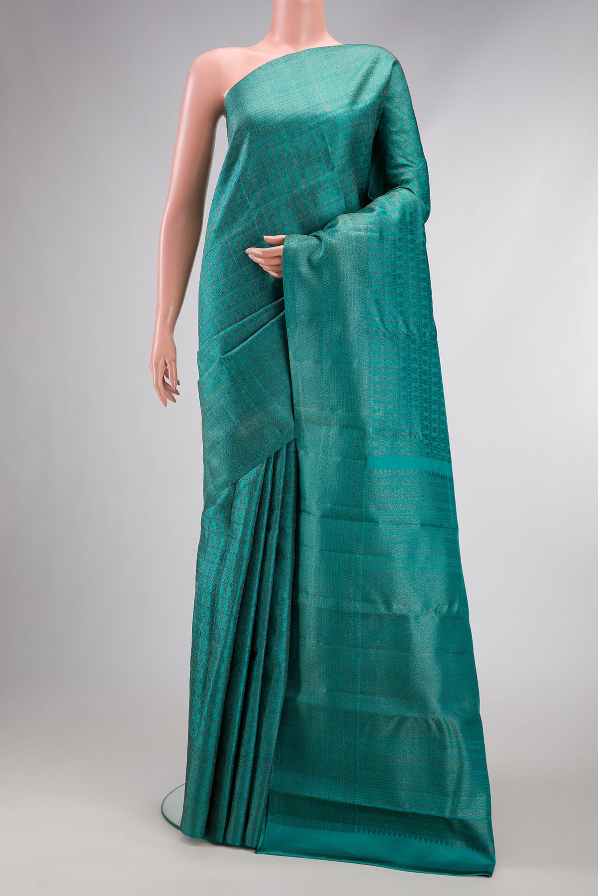 Maya Blue Kanjivaram Silk Saree with Jacquard design on the body and Fancy Border.  displayed on a mannequin