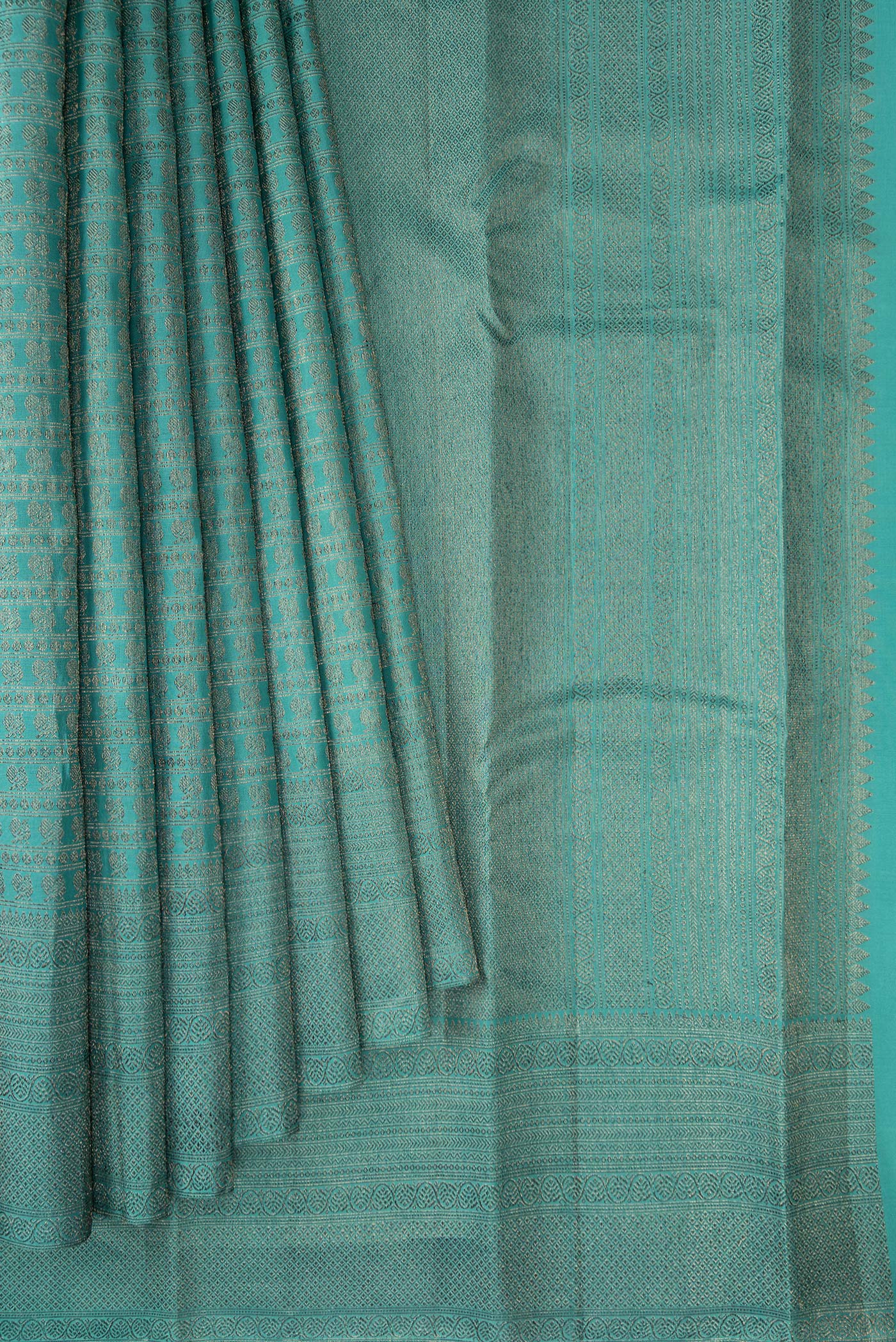 Pleats and pallu of Maya Blue Kanjivaram Silk Saree with Jacquard design on the body and Fancy Border. 