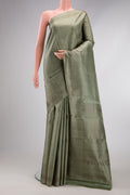 Light Green Dual Tone Kanjivaram Silk Saree with Jacquard design on the body and Zari Border.  displayed on a mannequin
