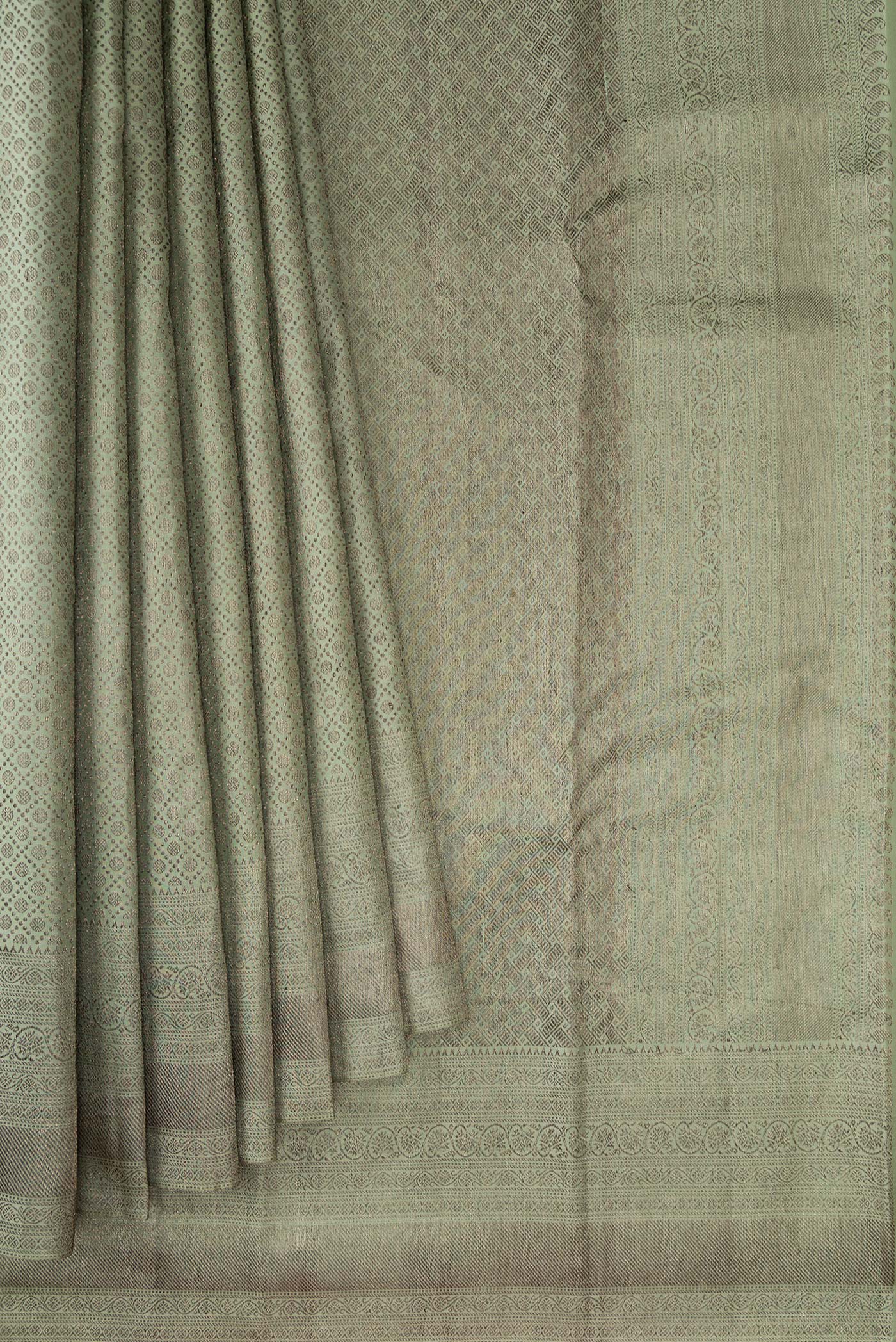 Pleats and pallu of Light Green Dual Tone Kanjivaram Silk Saree with Jacquard design on the body and Zari Border. 