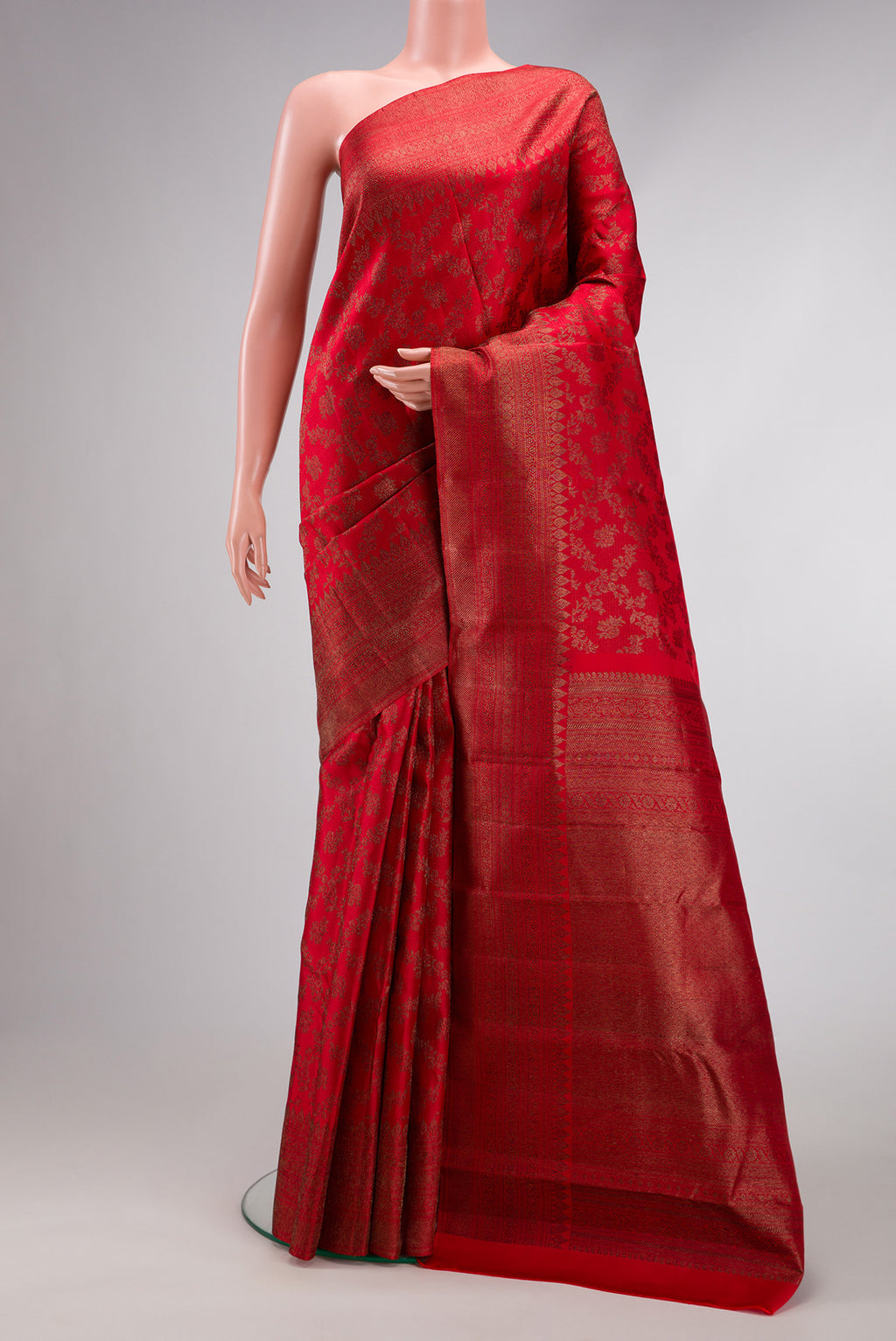 Red Dual Tone Kanjivaram Silk Saree with Jacquard design on the body and Fancy Border.  displayed on a mannequin
