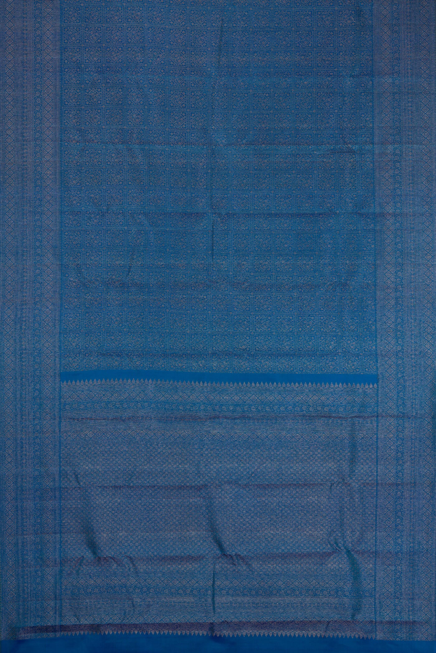 Flat view of Peacock Blue Dual Tone Kanjivaram Silk Saree with Zari Brocade on the body and Fancy Border. 