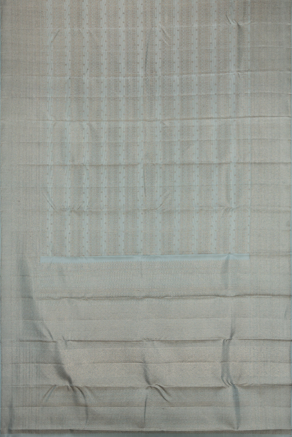 Flat view of Grey Kanjivaram Silk Saree with Zari Brocade on the body and Fancy Border. 
