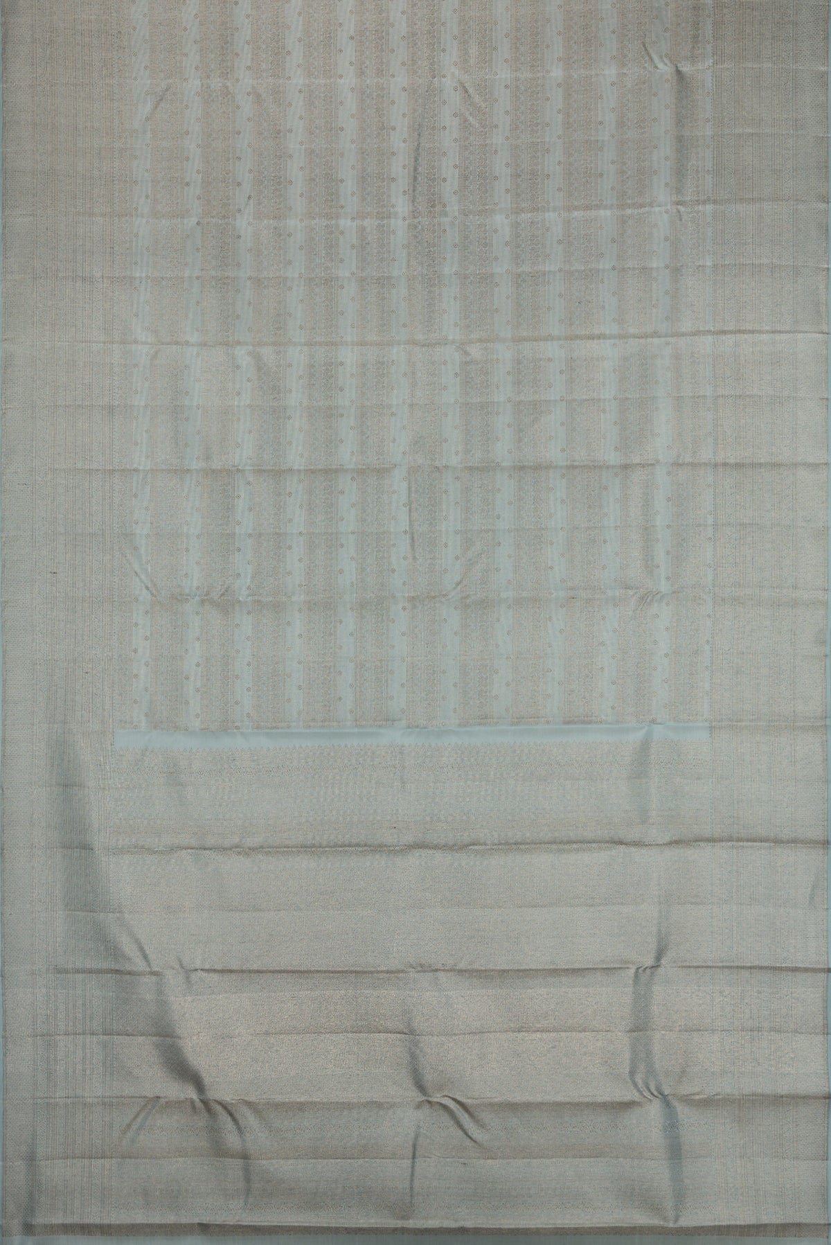 Flat view of Grey Kanjivaram Silk Saree with Zari Brocade on the body and Fancy Border. 