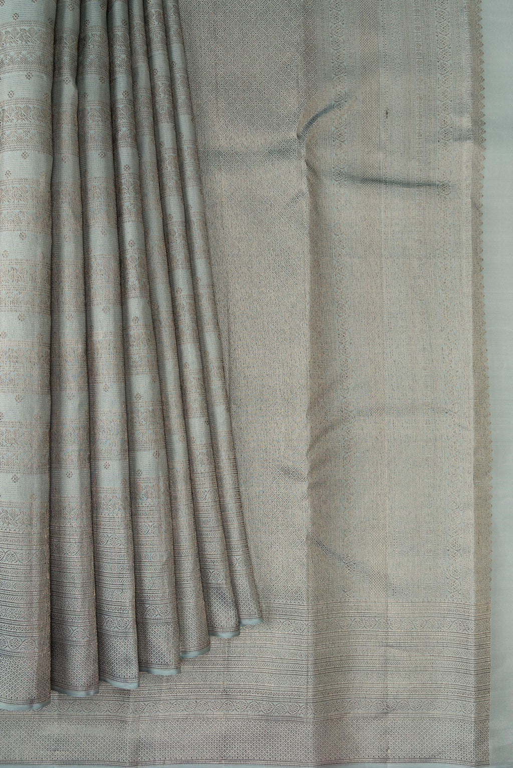 Pleats and pallu of Grey Kanjivaram Silk Saree with Zari Brocade on the body and Fancy Border. 