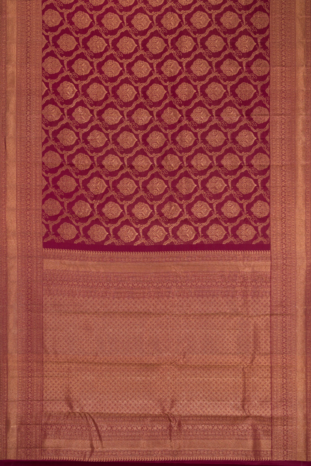 Flat view of Maroon Kanjivaram Silk Saree with Zari Brocade on the body and Fancy Border. 