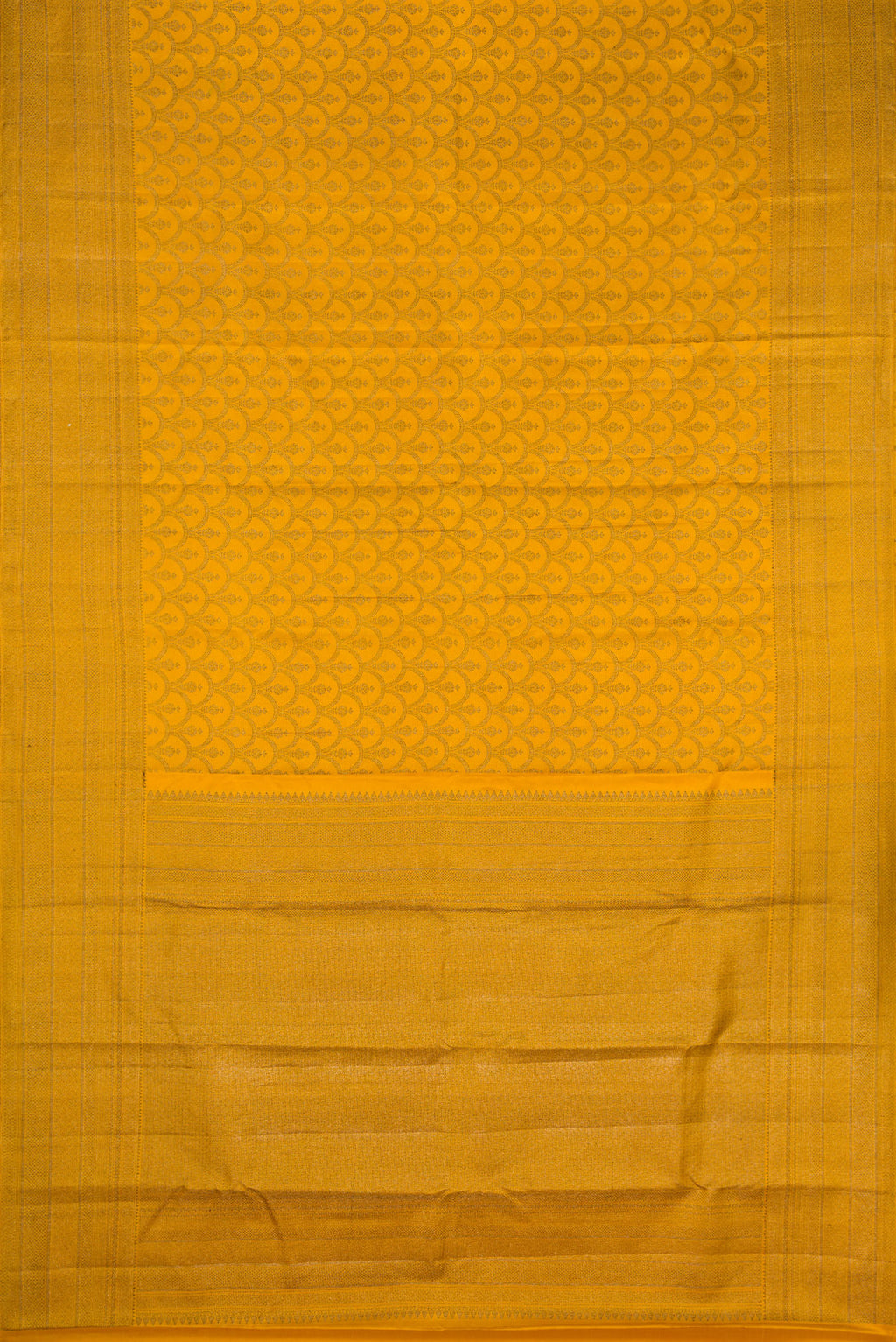 Flat view of Mustard Kanjivaram Silk Saree with Jacquard design on the body and Fancy Border. 