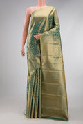 Green Dual Tone Kanjivaram Tissue Silk Saree with Zari Brocade on the body and Zari Border.  displayed on a mannequin