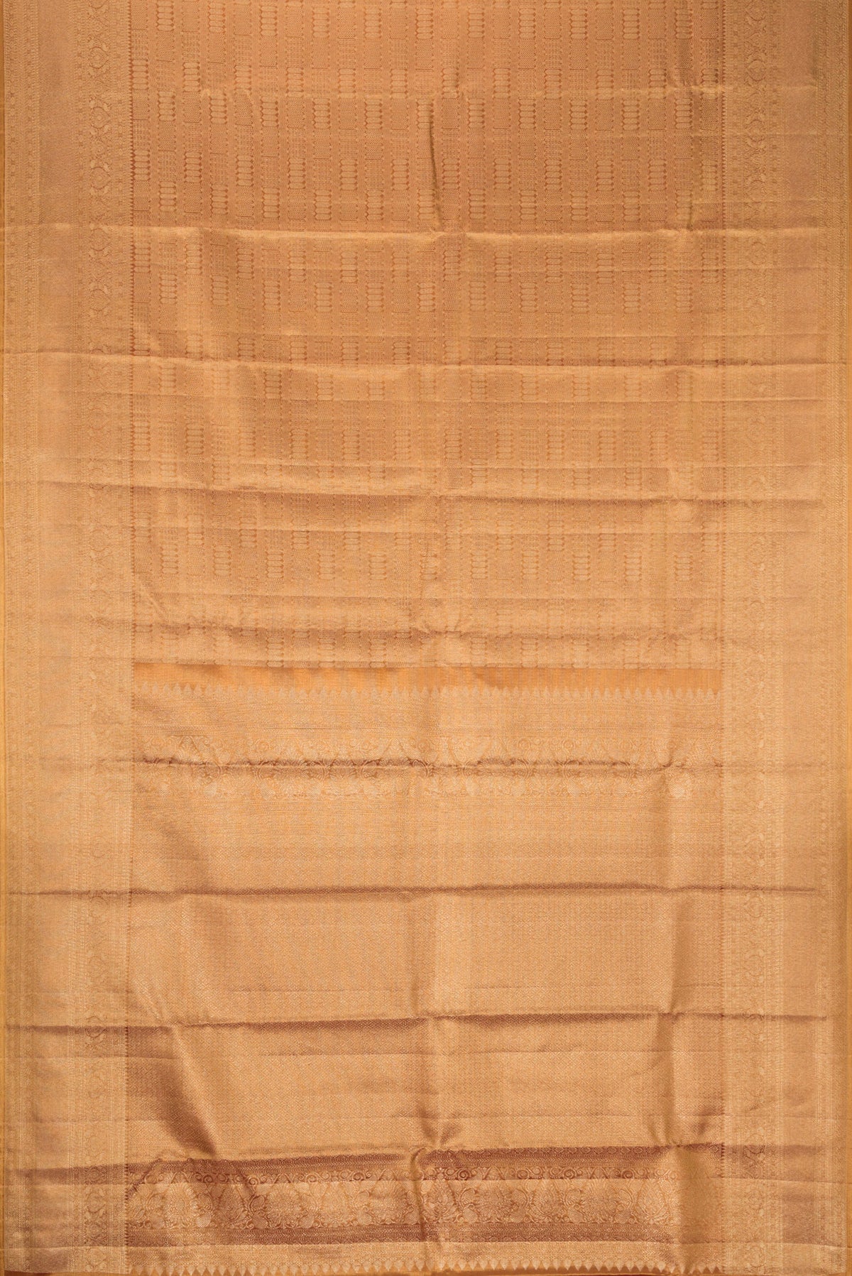 Flat view of Gold Dual Tone Kanjivaram Tissue Silk Saree with Zari Brocade on the body and Zari Border. 