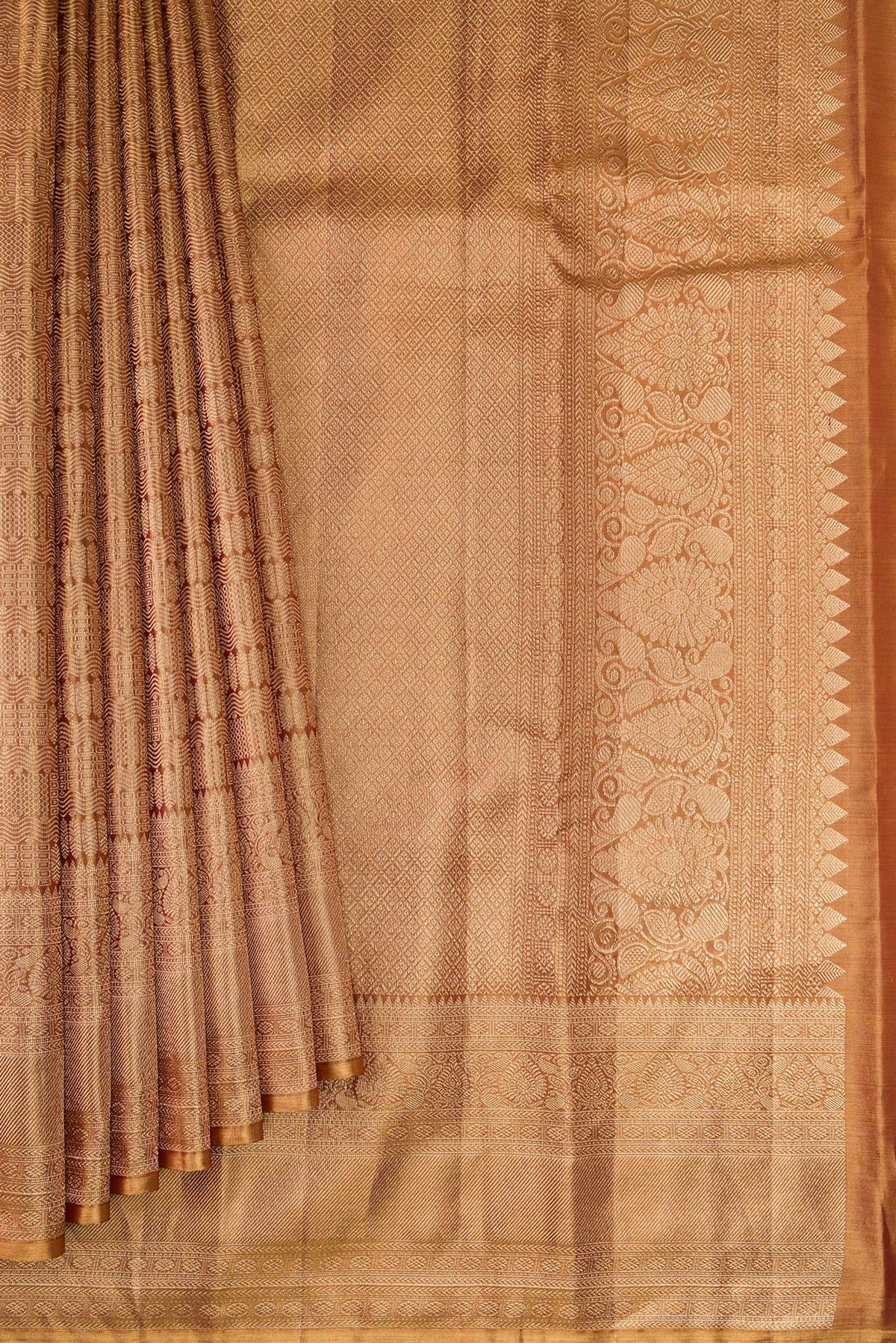 Pleats and pallu of Gold Dual Tone Kanjivaram Tissue Silk Saree with Zari Brocade on the body and Zari Border. 