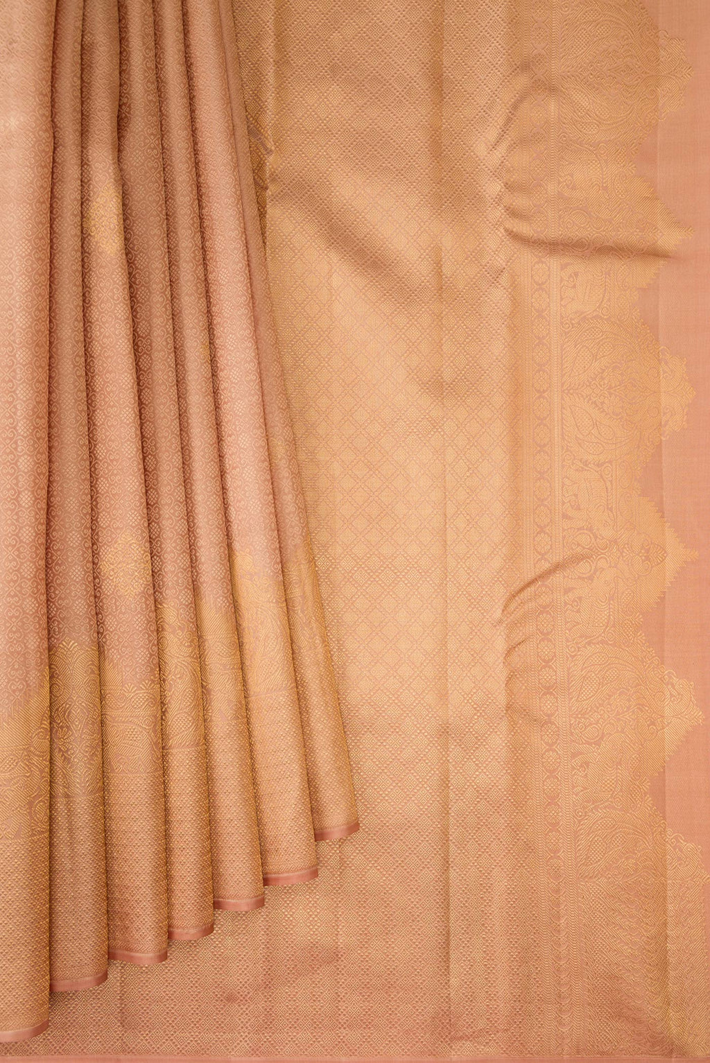 Pleats and pallu of Golden Peach Dual Tone Kanjivaram Silk Saree with Jacquard With Zari Butta on the body and Fancy Border. 