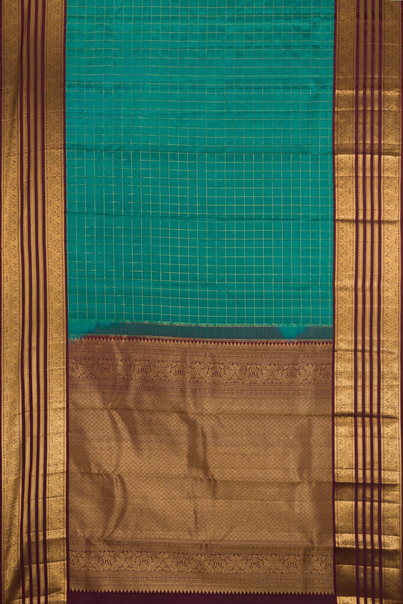 Flat view of Teal Kanjivaram Silk Saree with Checked design on the body and Zari Border. 