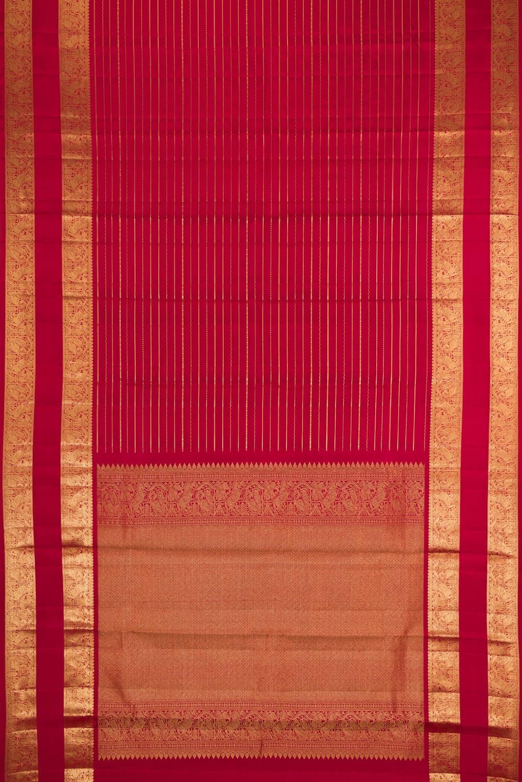 Flat view of Maroon Kanjivaram Silk Saree with Stripes on the body and Zari Border. 