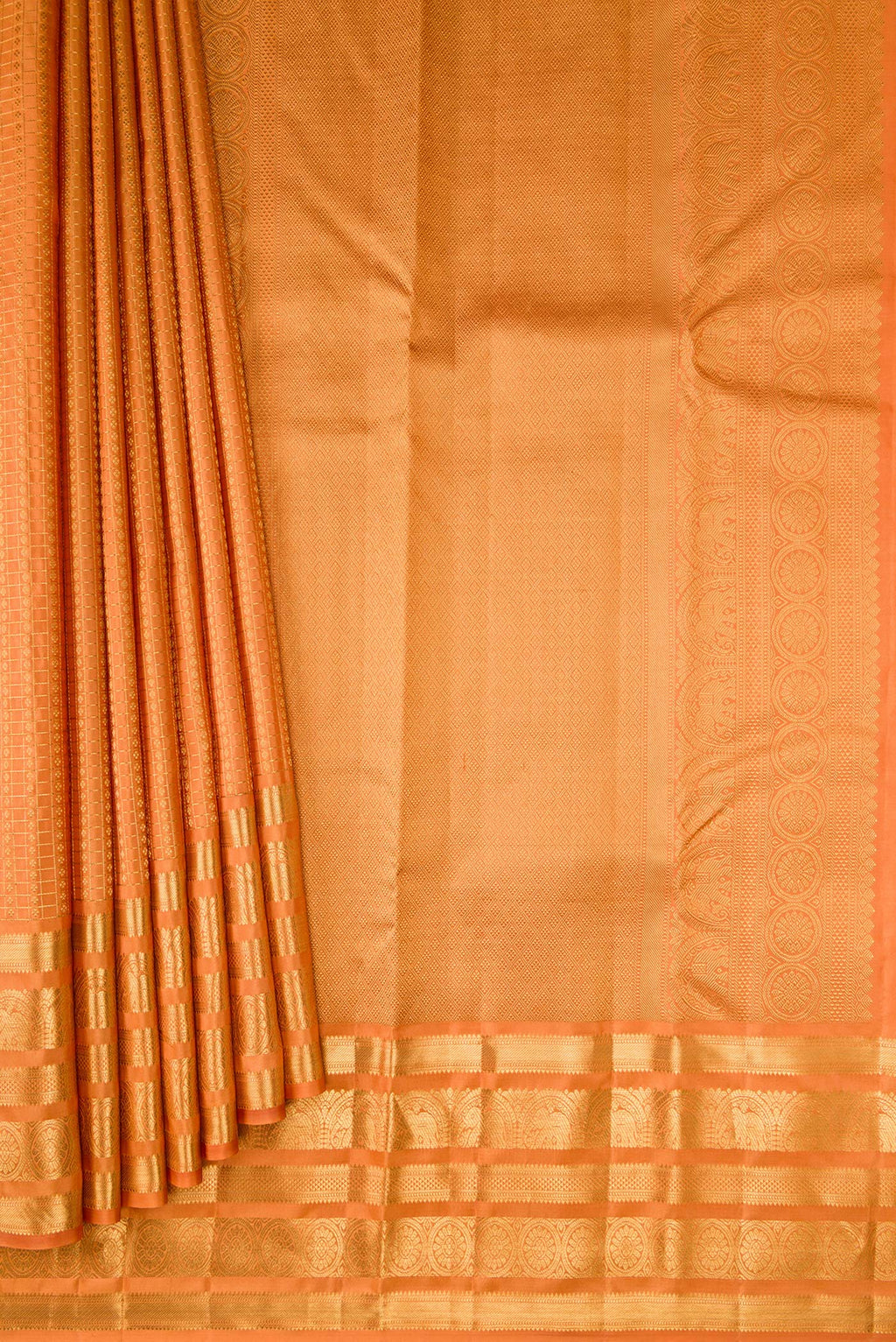 Pleats and pallu of Orange Kanjivaram Silk Saree with Zari Brocade on the body and Zari Border. 
