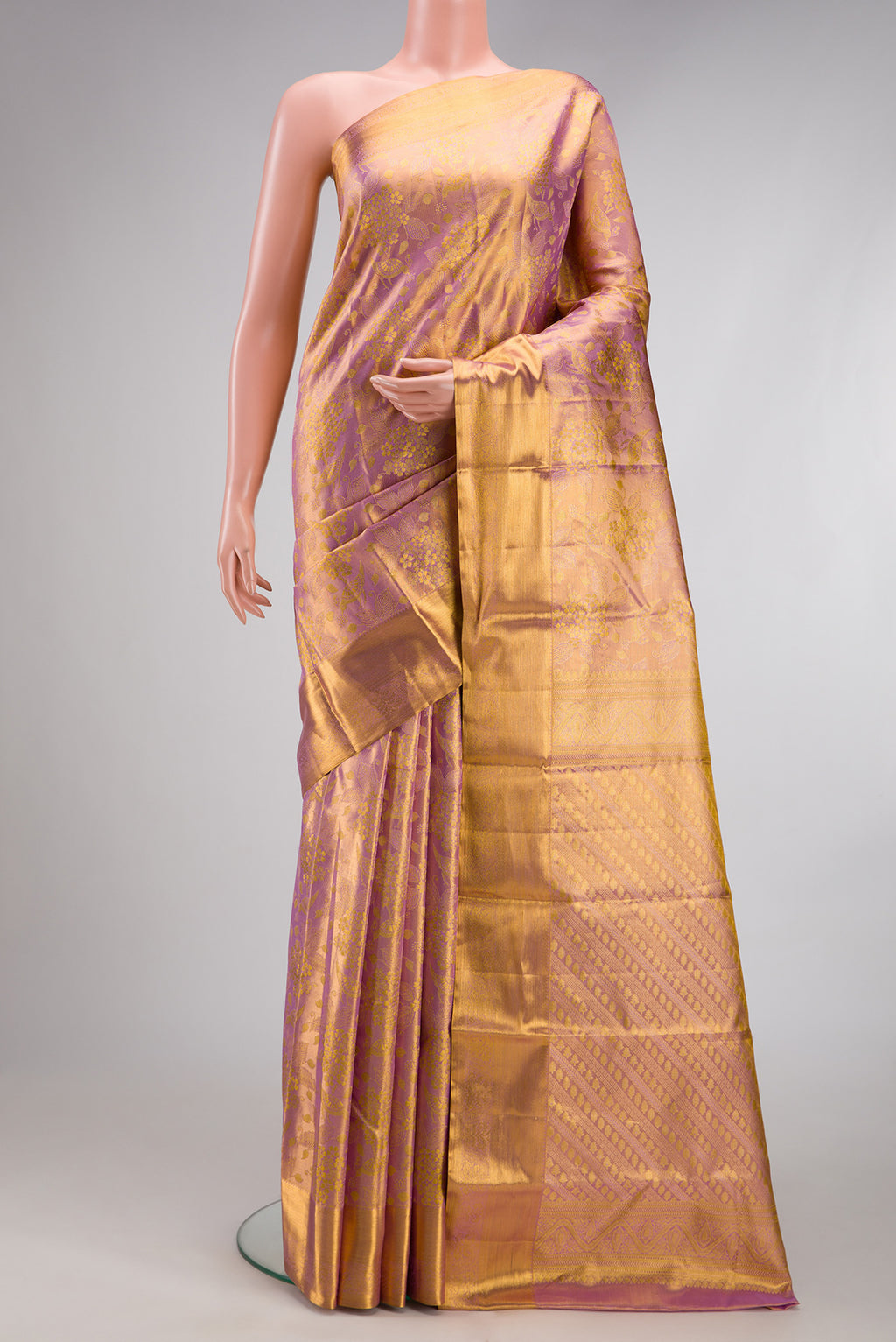 Rose Gold Dual Tone Kanchipuram Tissue Silk Saree with Zari Brocade on the body and Zari Border.  displayed on a mannequin