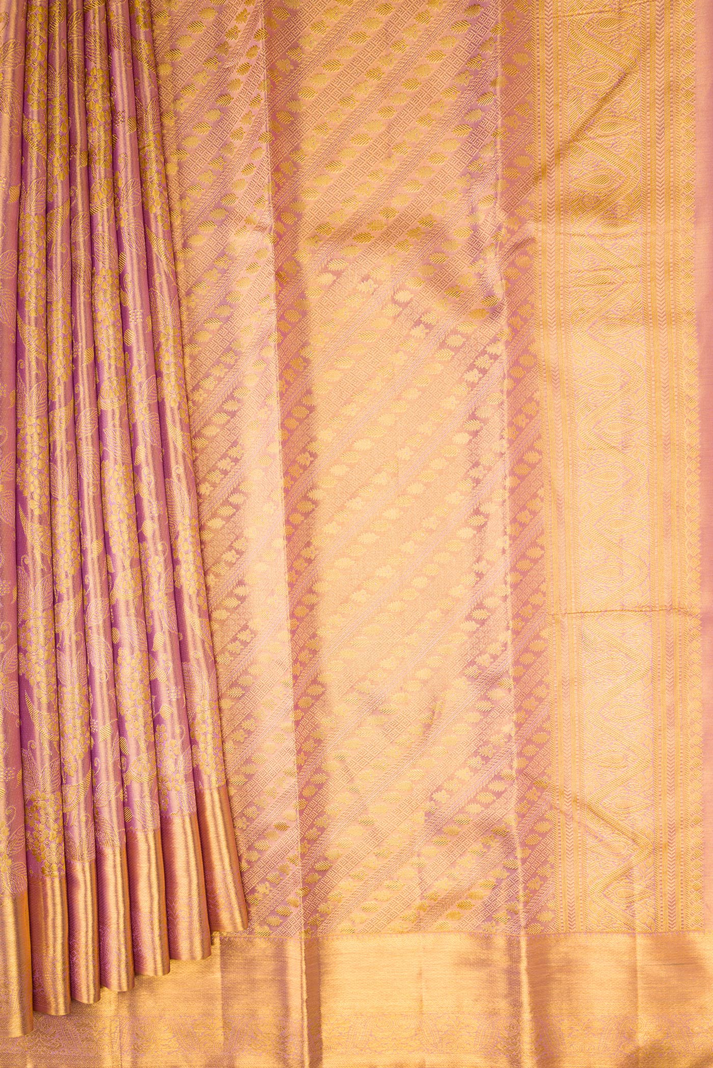 Pleats and pallu of Rose Gold Dual Tone Kanchipuram Tissue Silk Saree with Zari Brocade on the body and Zari Border. 