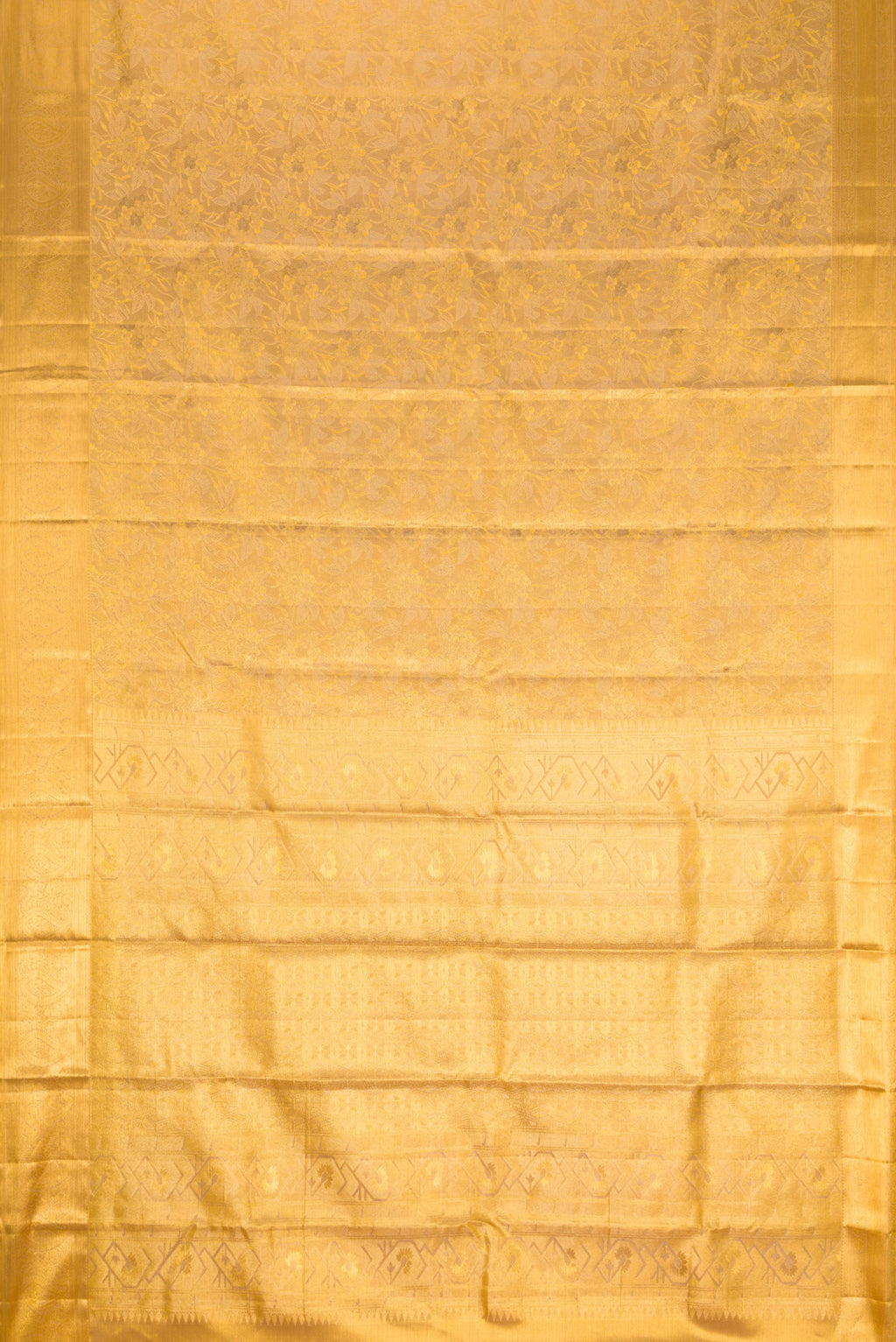 Flat view of Gold Dual Tone Kanchipuram Tissue Silk Saree with Zari Brocade on the body and Zari Border. 