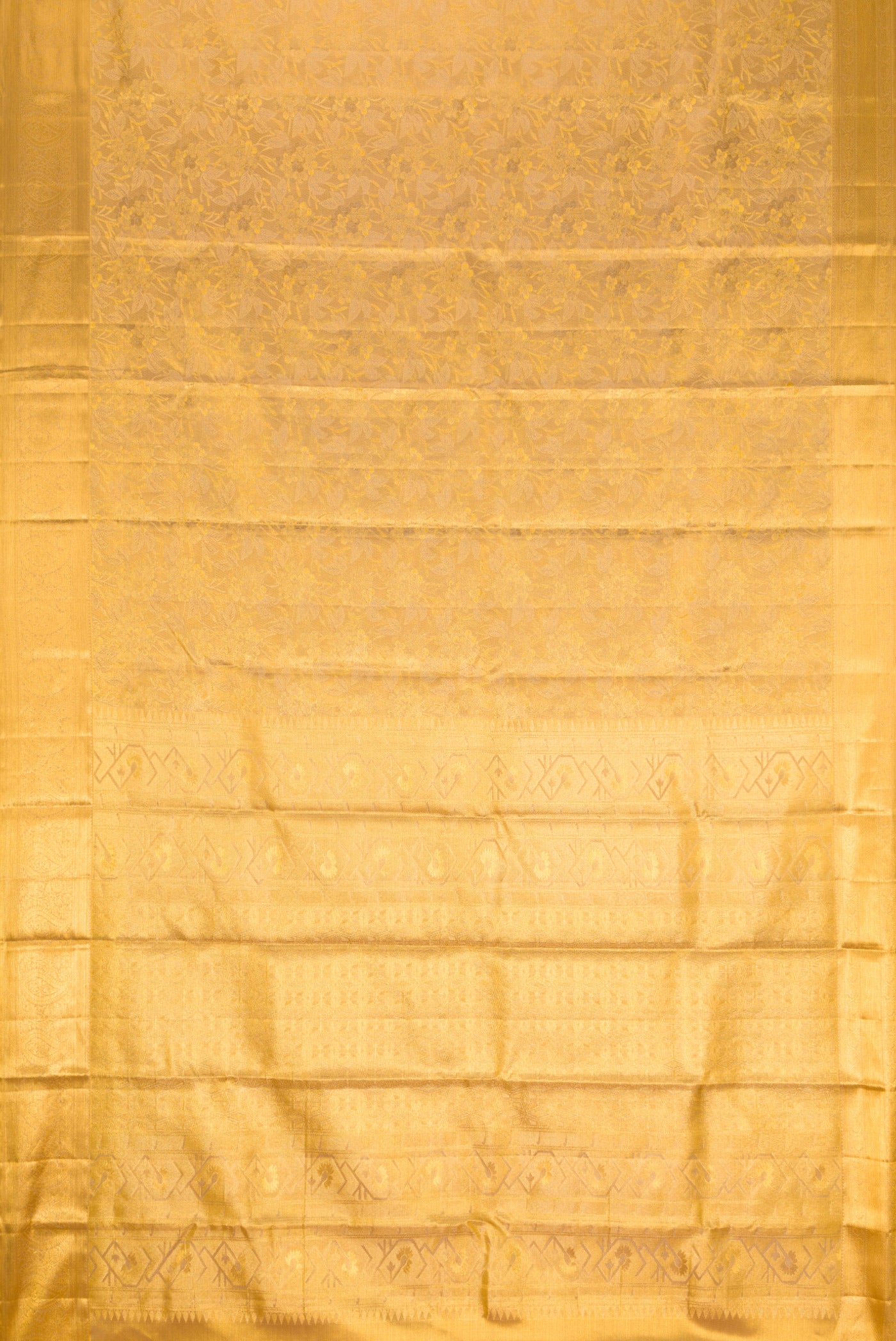 Flat view of Gold Dual Tone Kanchipuram Tissue Silk Saree with Zari Brocade on the body and Zari Border. 