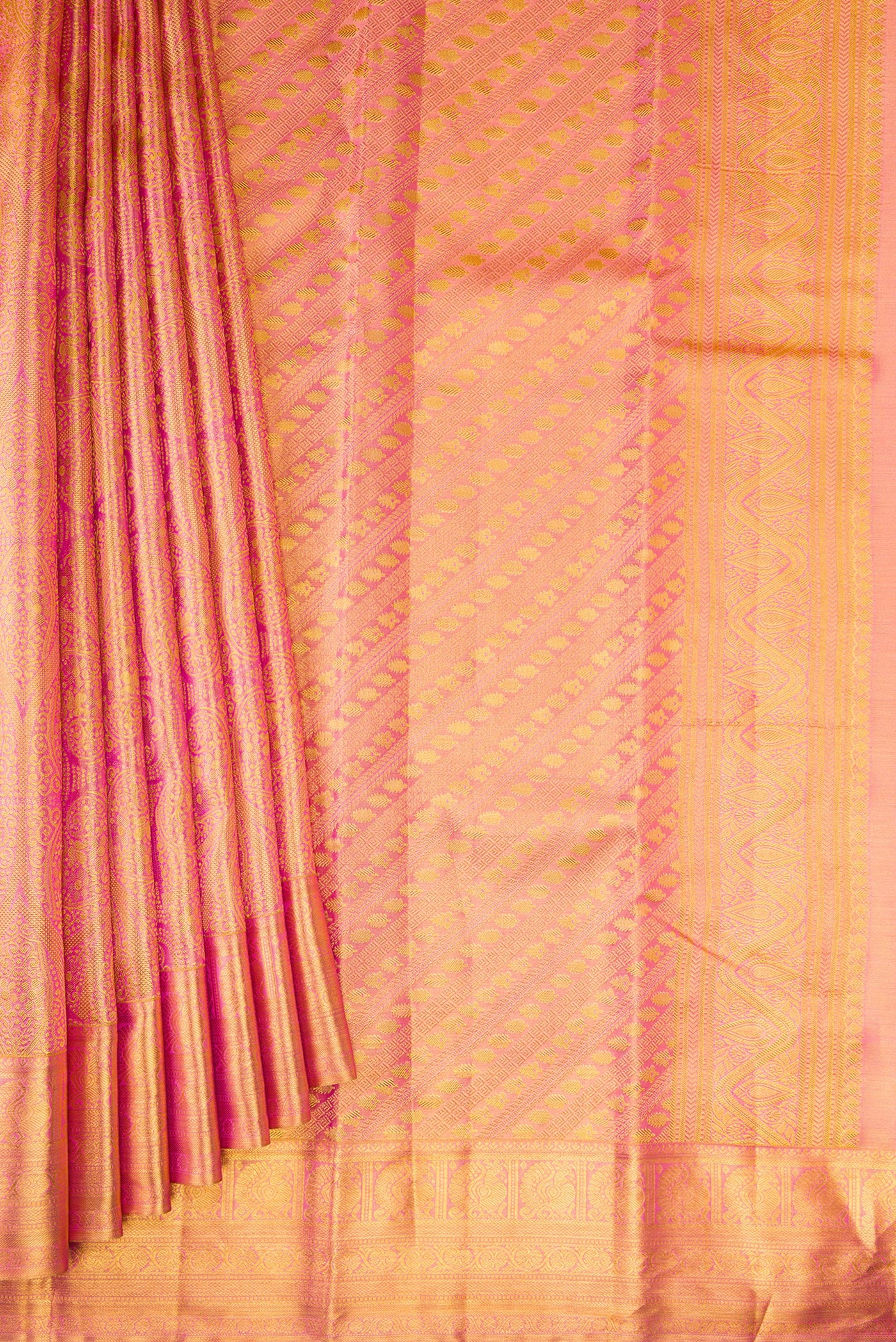 Pleats and pallu of Pink Dual Tone Kanchipuram Tissue Silk Saree with Zari Brocade on the body and Zari Border. 