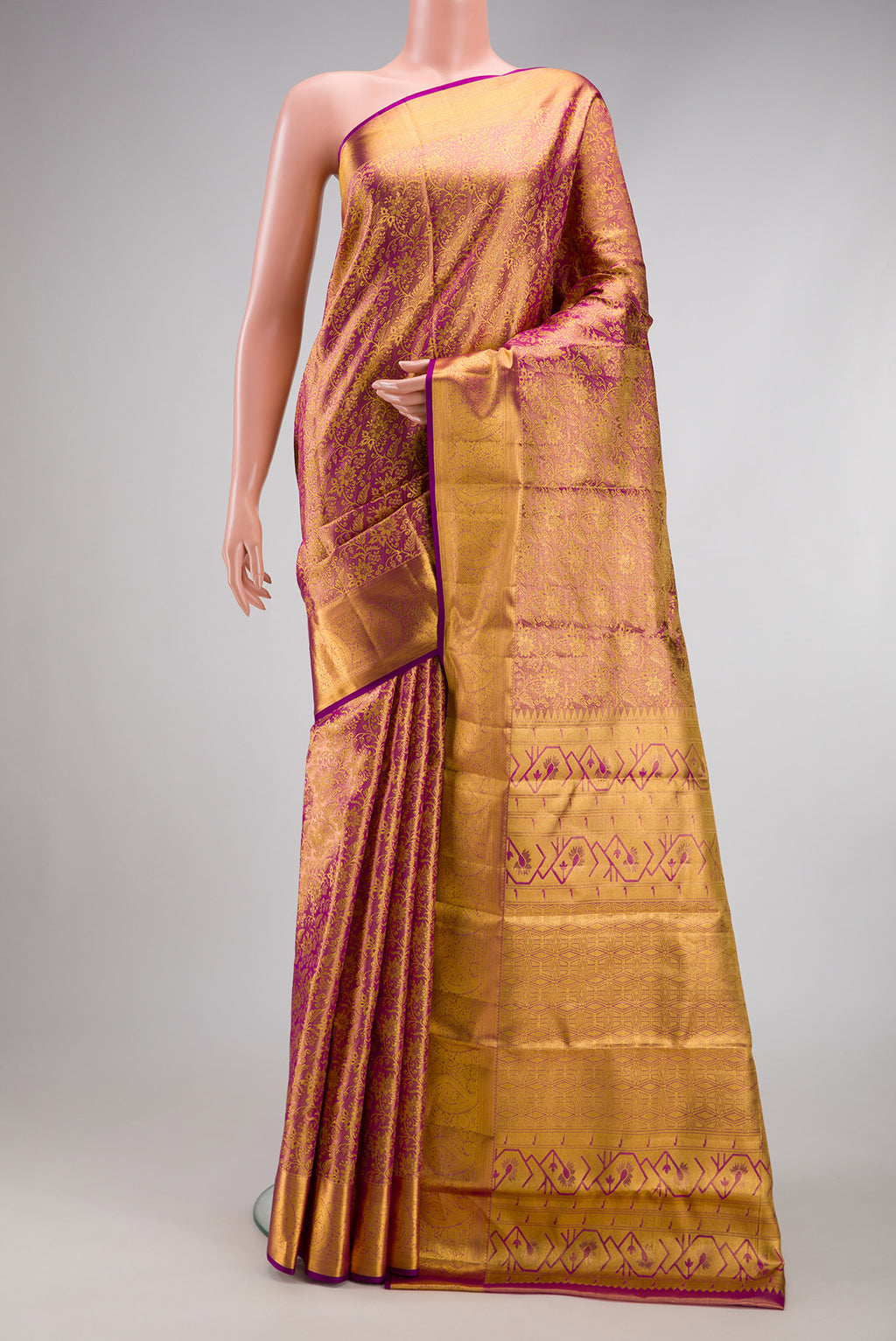 Rose Gold Dual Tone Kanchipuram Tissue Silk Saree with Zari Brocade on the body and Zari Border.  displayed on a mannequin