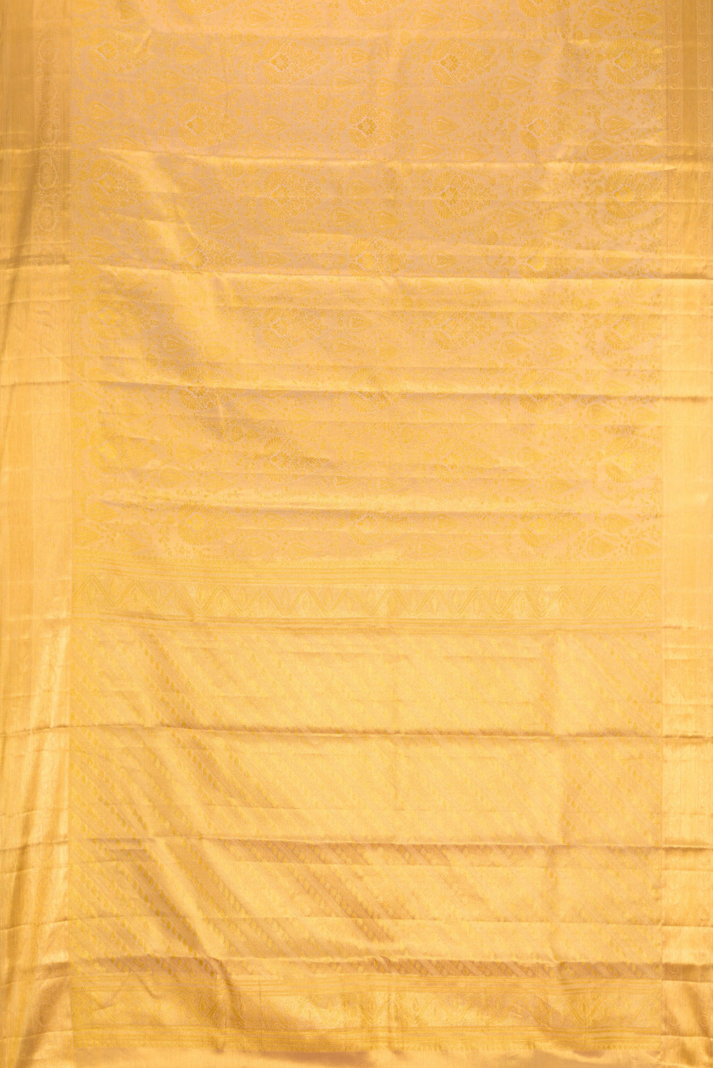 Flat view of Gold Dual Tone Kanchipuram Tissue Silk Saree with Zari Brocade on the body and Zari Border. 