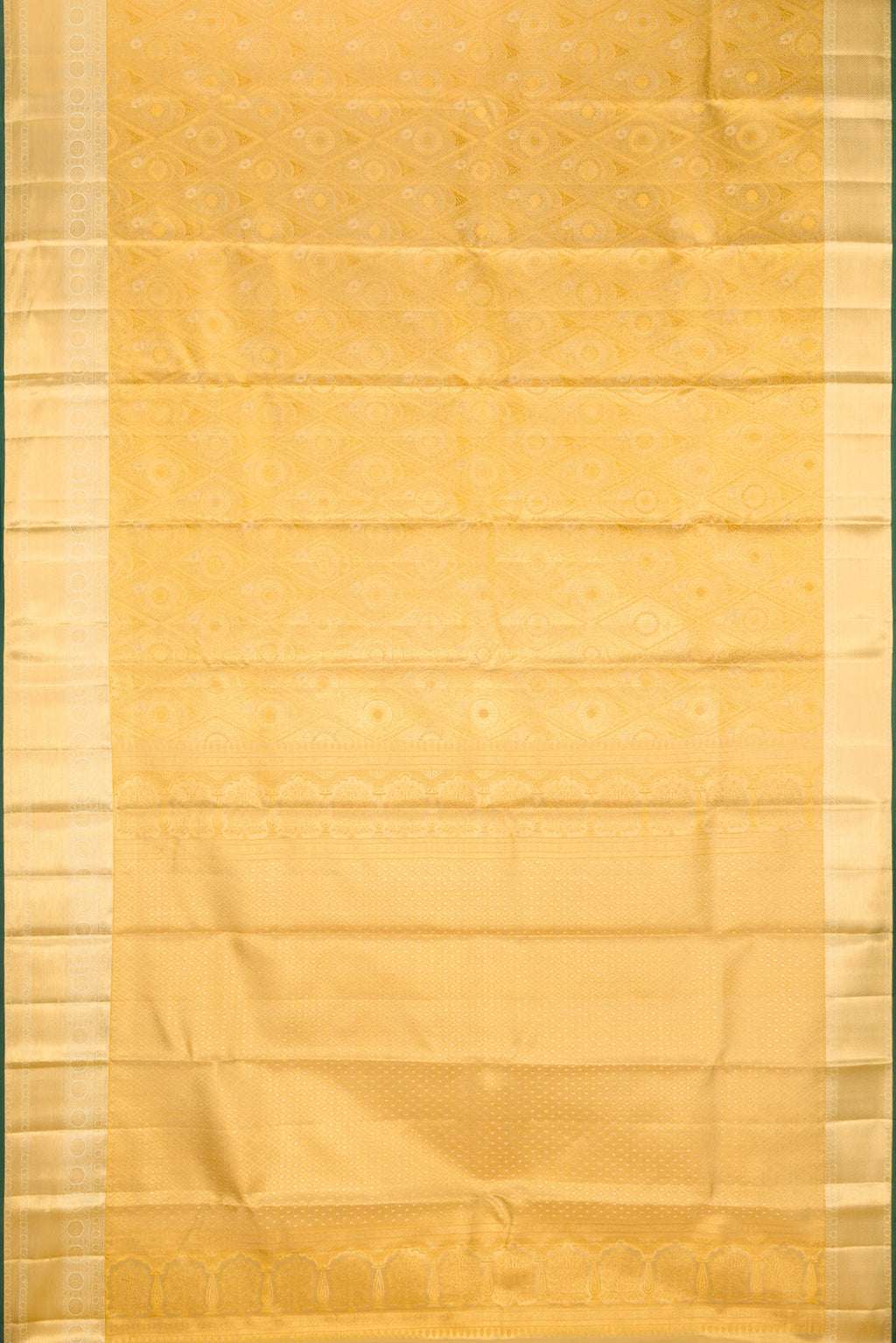 Flat view of Gold Kanchipuram Tissue Silk Saree with Zari Brocade on the body and Zari Border. 
