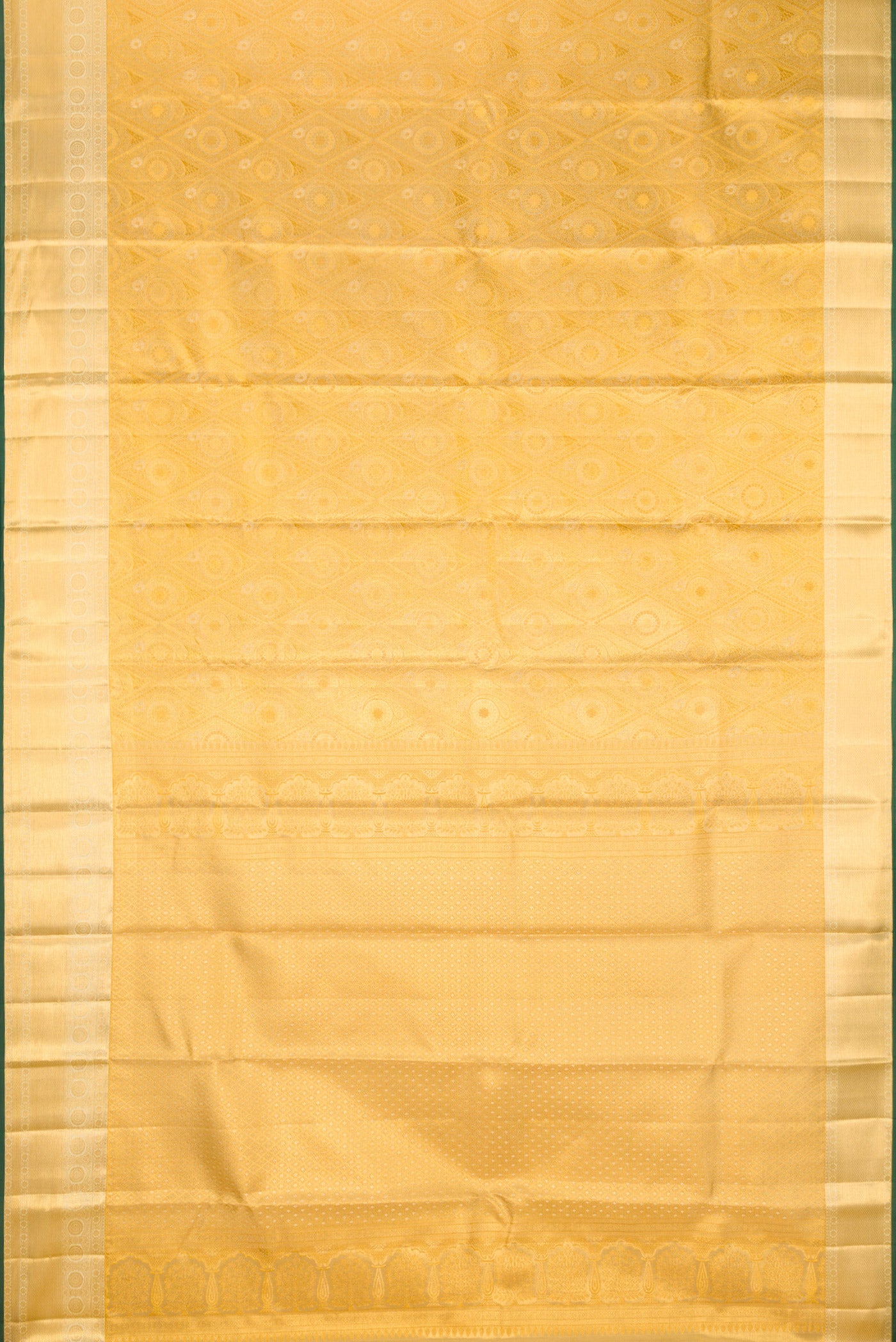 Flat view of Gold Kanchipuram Tissue Silk Saree with Zari Brocade on the body and Zari Border. 