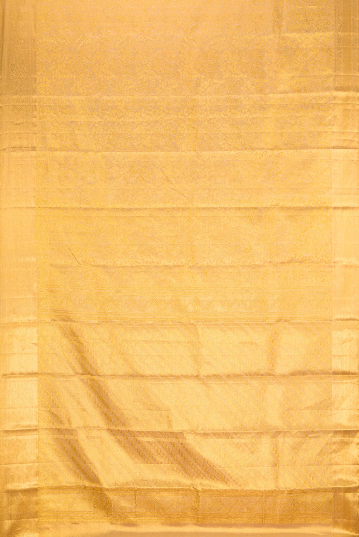 Flat view of Gold Dual Tone Kanchipuram Tissue Silk Saree with Zari Brocade on the body and Zari Border. 