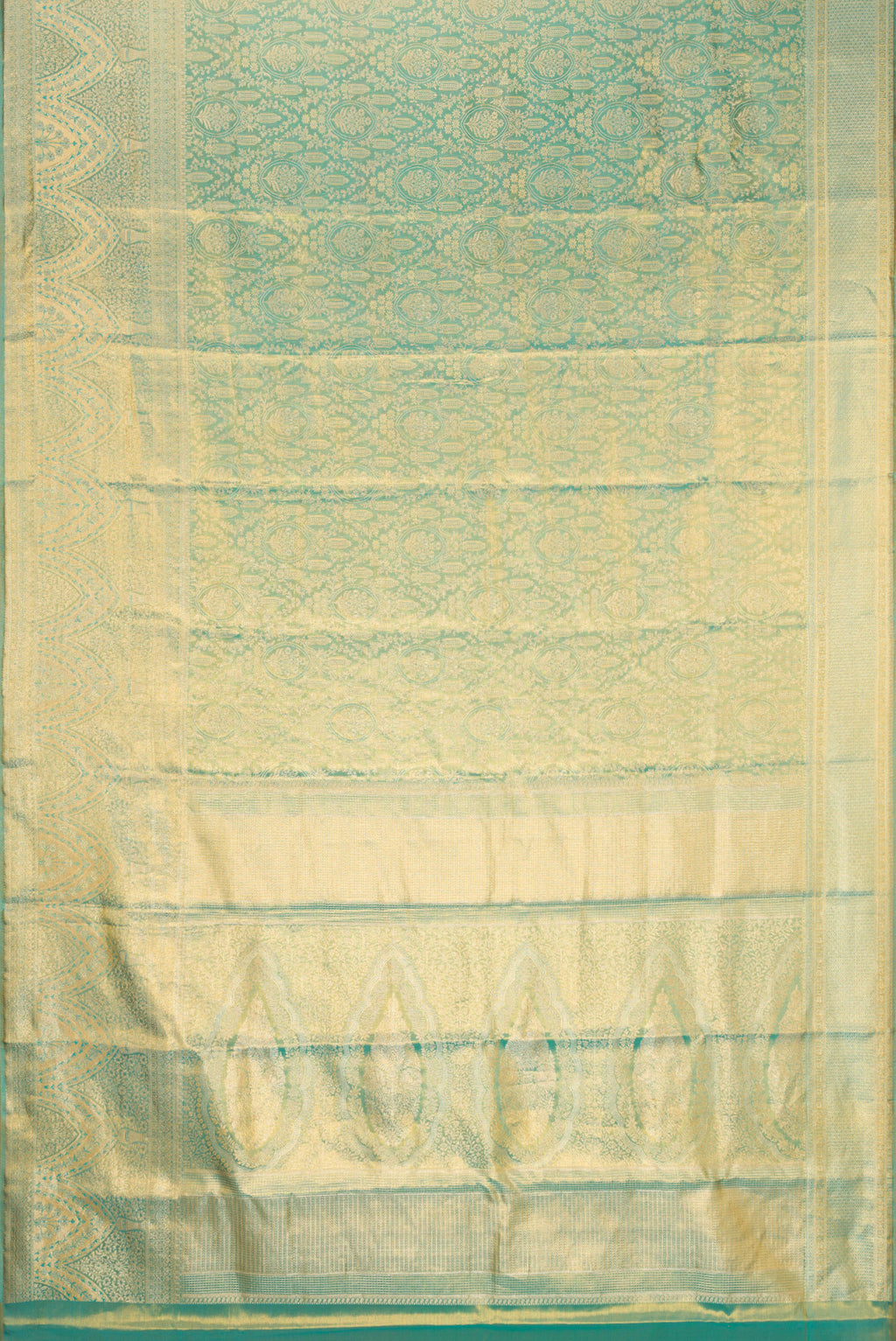Flat view of Sea Green Dual Tone Kanjivaram Tissue Silk Saree with Zari Brocade on the body and Fancy Border. 